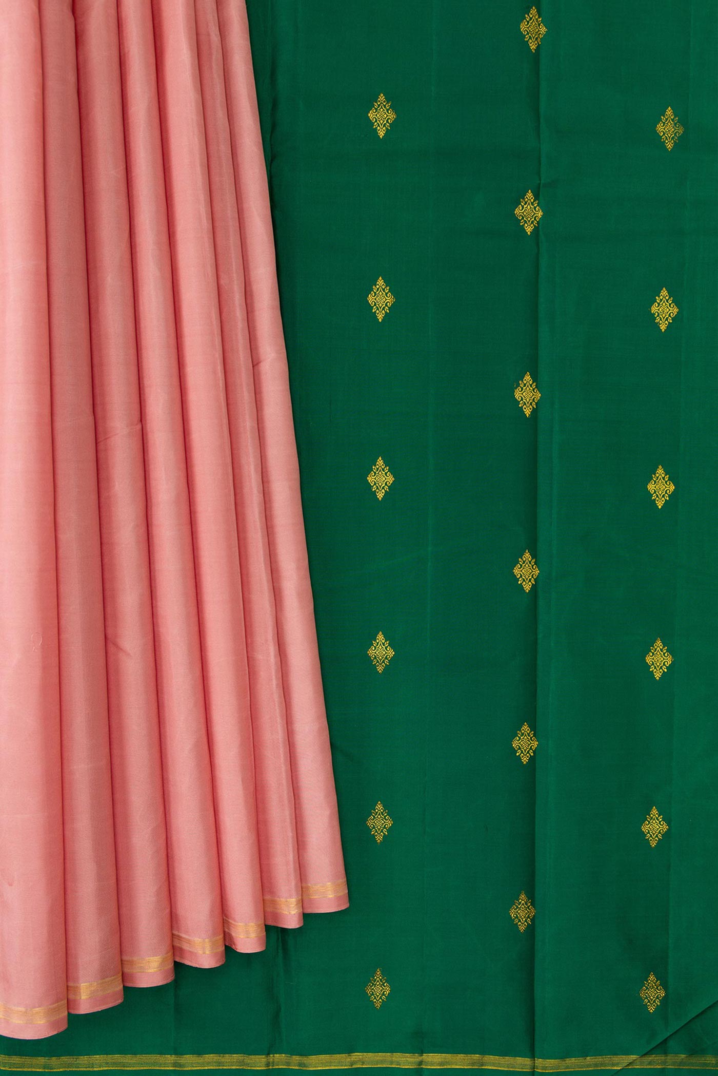 Pleats and pallu of Rose Gold Dual Tone Kanchipuram Silk Saree with Plain Body and Thin Zari Line. 