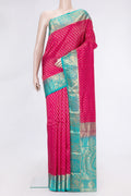 Pink Dual Tone Kanchipuram Silk Saree with Zari Butta on the body and Zari Border.  displayed on a mannequin