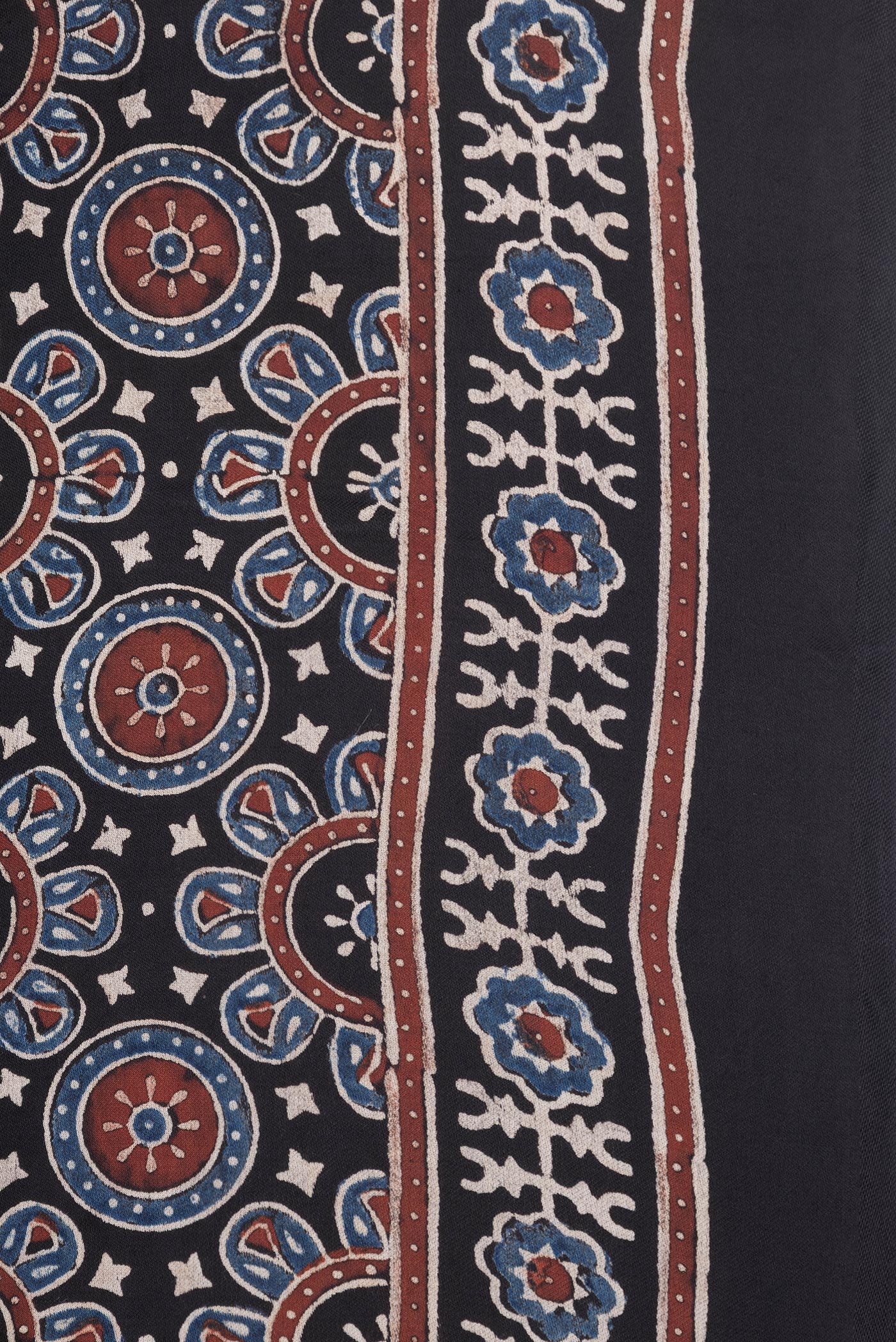 Border image of Black Dual Tone Crepe Saree with Ajrakh Print on the body and Printed Border. 