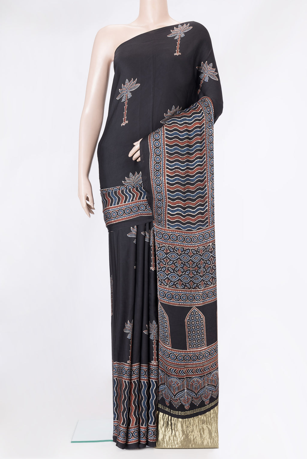 Black Dual Tone Blended Crepe Saree with Ajrakh Print on the body and Printed Border.  displayed on a mannequin
