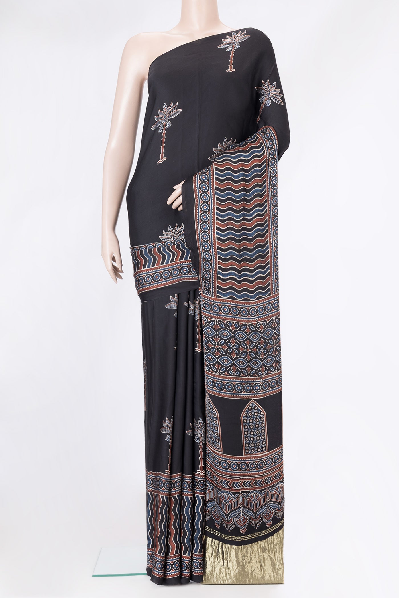 Black Dual Tone Blended Crepe Saree with Ajrakh Print on the body and Printed Border.  displayed on a mannequin