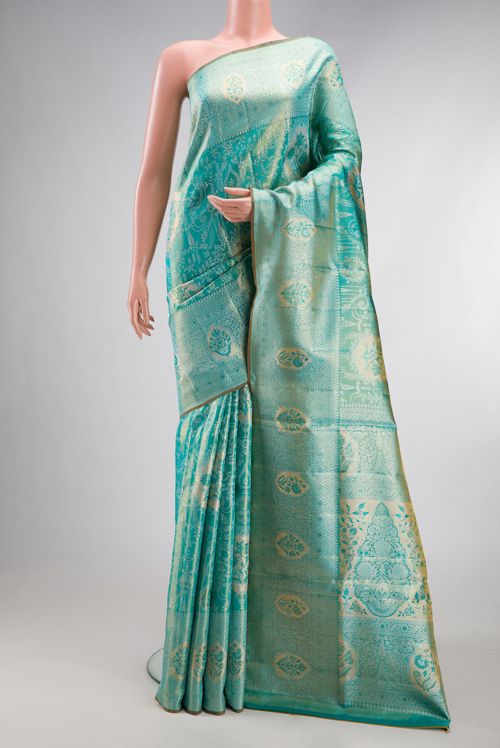 Turquoise Dual Tone Kanchipuram Tissue Silk Saree with Zari Brocade on the body and Zari Border.  displayed on a mannequin