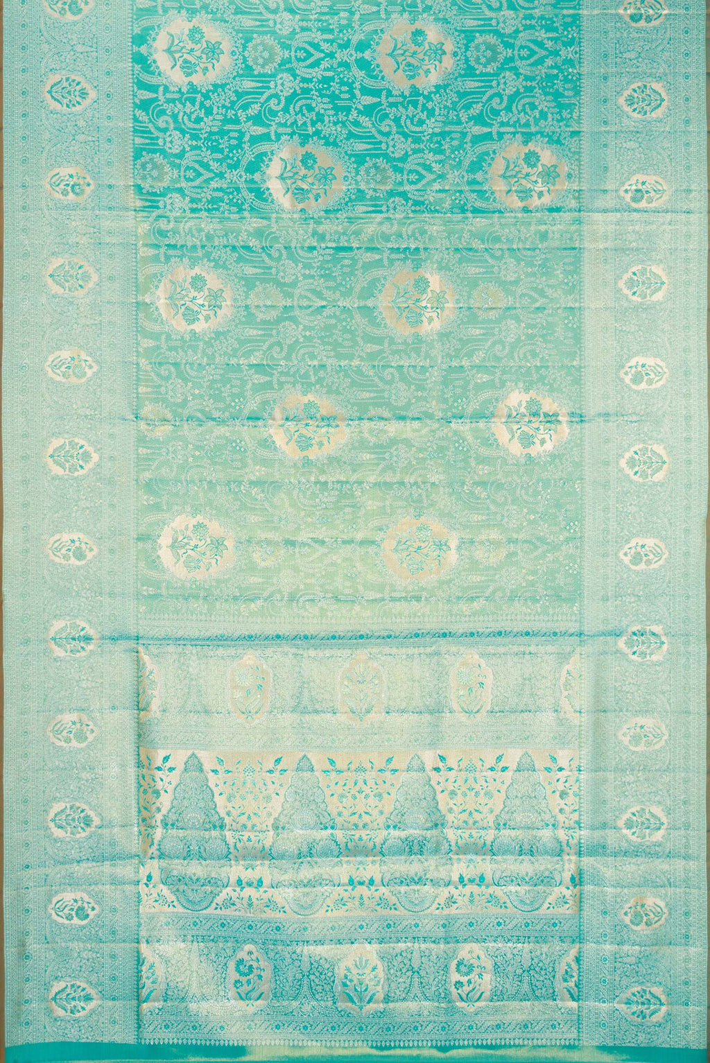 Flat view of Turquoise Dual Tone Kanchipuram Tissue Silk Saree with Zari Brocade on the body and Zari Border. 