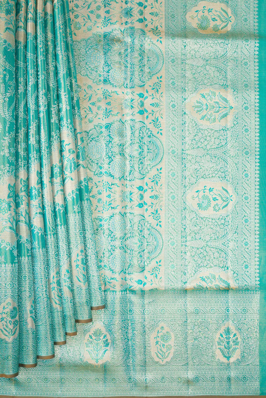 Pleats and pallu of Turquoise Dual Tone Kanchipuram Tissue Silk Saree with Zari Brocade on the body and Zari Border. 