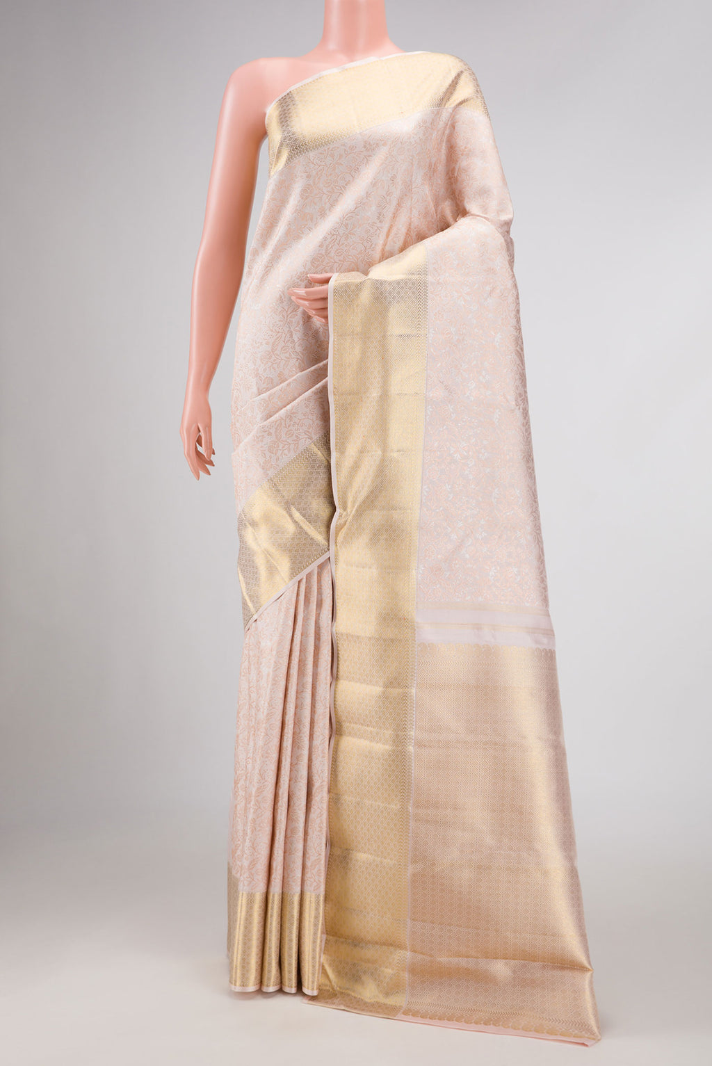 Pure Silk Pure Zari Rose pink Kanchipuram Saree with Zari Brocade on the body and Zari Border displayed on a mannequin