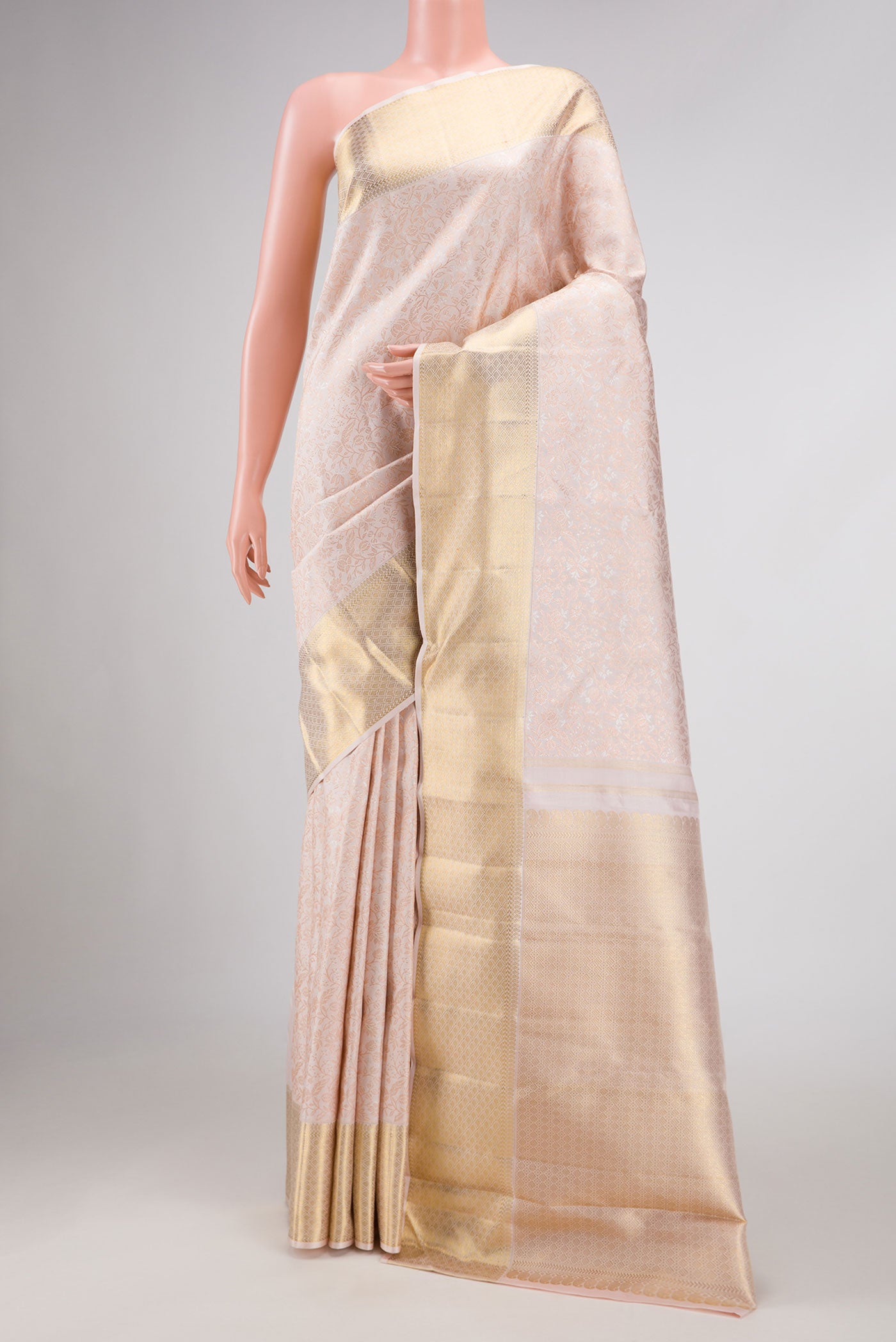 Pure Silk Pure Zari Rose pink Kanchipuram Saree with Zari Brocade on the body and Zari Border displayed on a mannequin