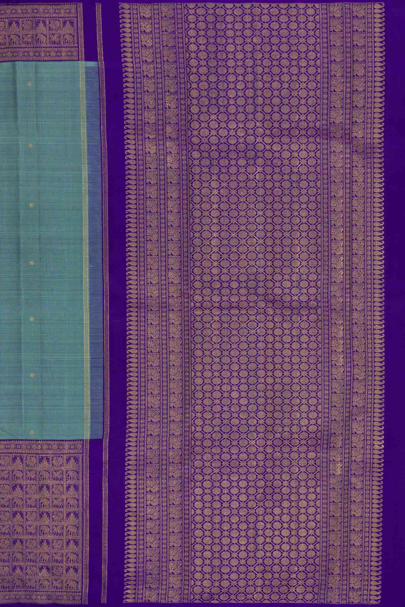 Close up image of the pallu of Pure Silk Pure Zari Maya Blue Dual Tone Kanjivaram Saree with Zari Butta on the body and Fancy Border. 