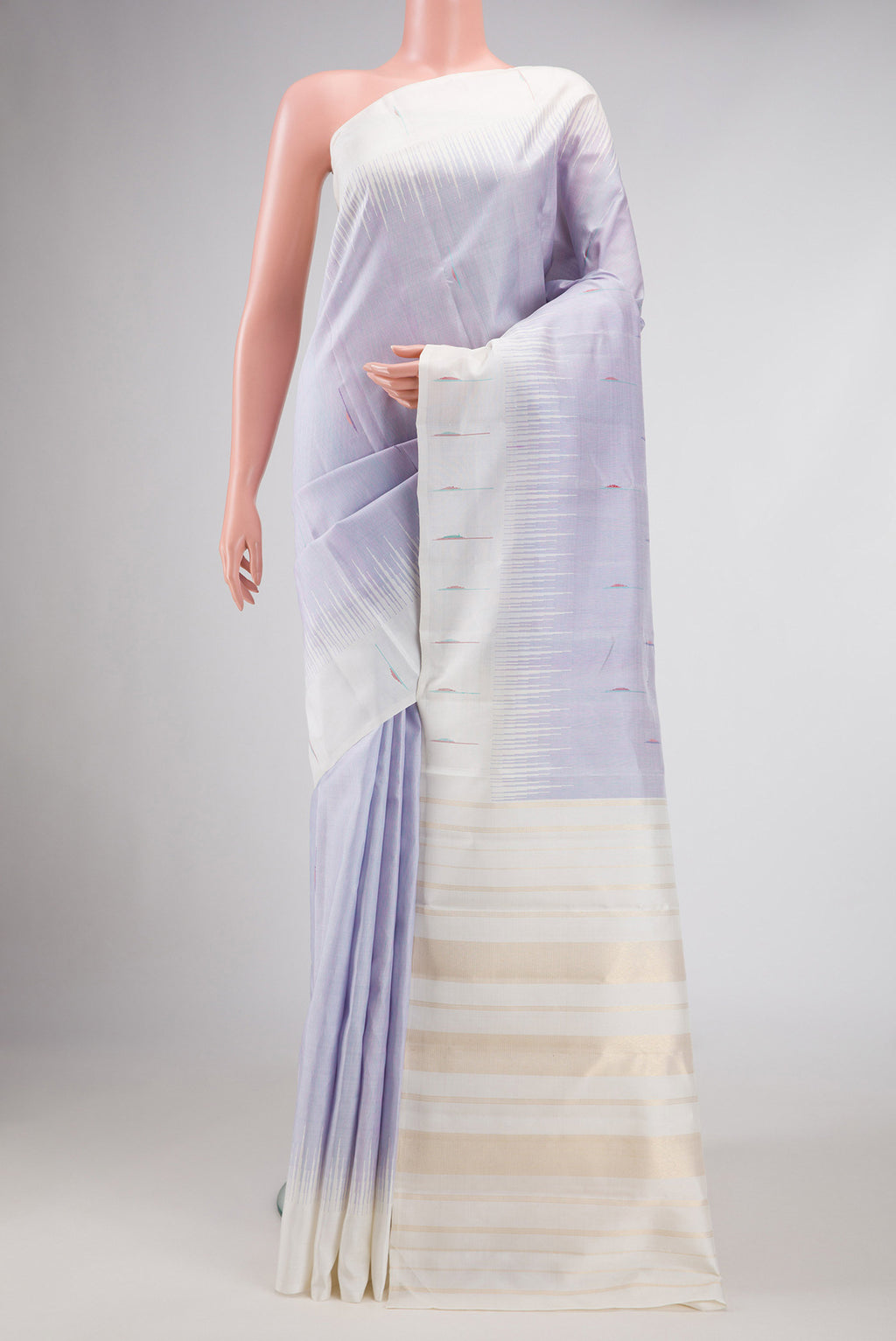 Pure Silk Pure Zari Lavender Dual Tone Kanjivaram Saree with Thread Butta on the body and Thread Border.  displayed on a mannequin