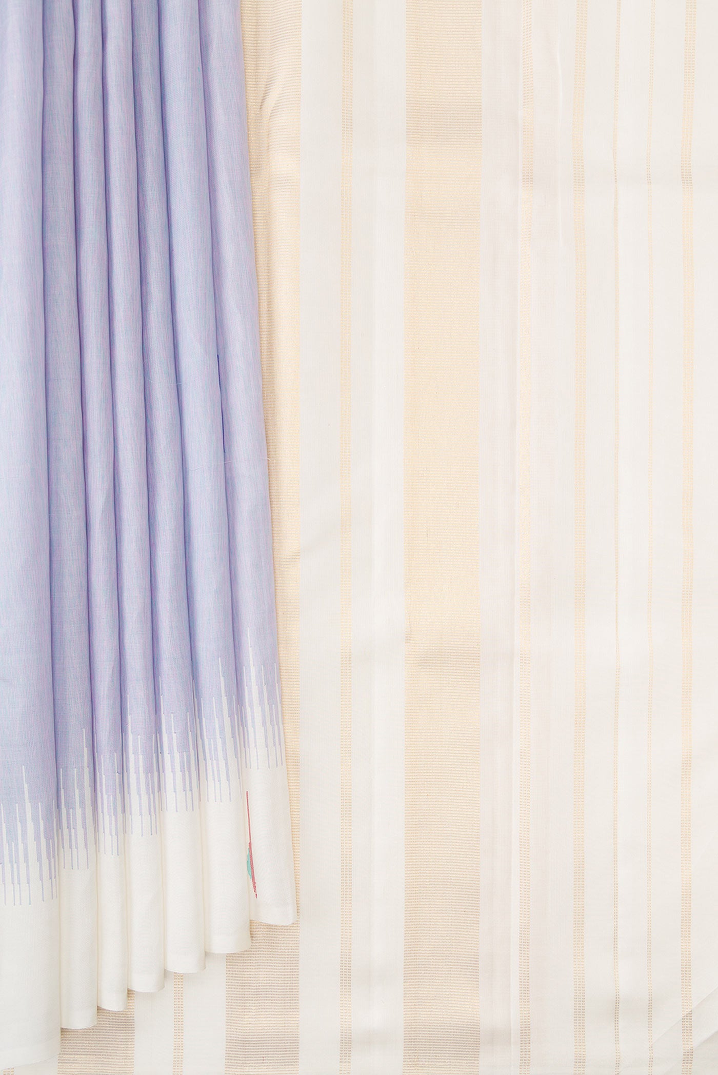 Pleats and pallu of Pure Silk Pure Zari Lavender Dual Tone Kanjivaram Saree with Thread Butta on the body and Thread Border. 