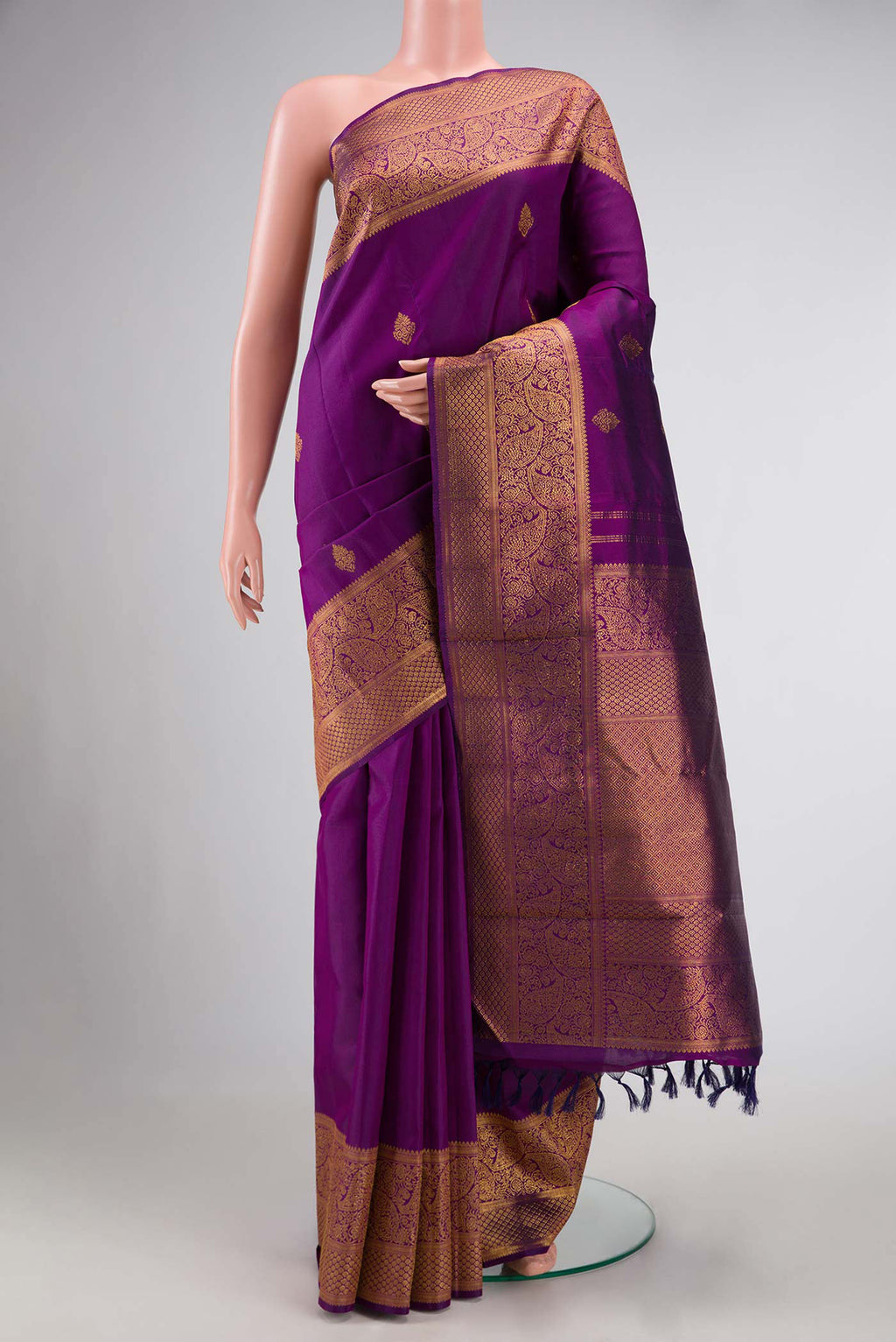 Purple Dual Tone Kanchipuram Silk Saree with Zari Butta on the body and Zari Border displayed on a mannequin