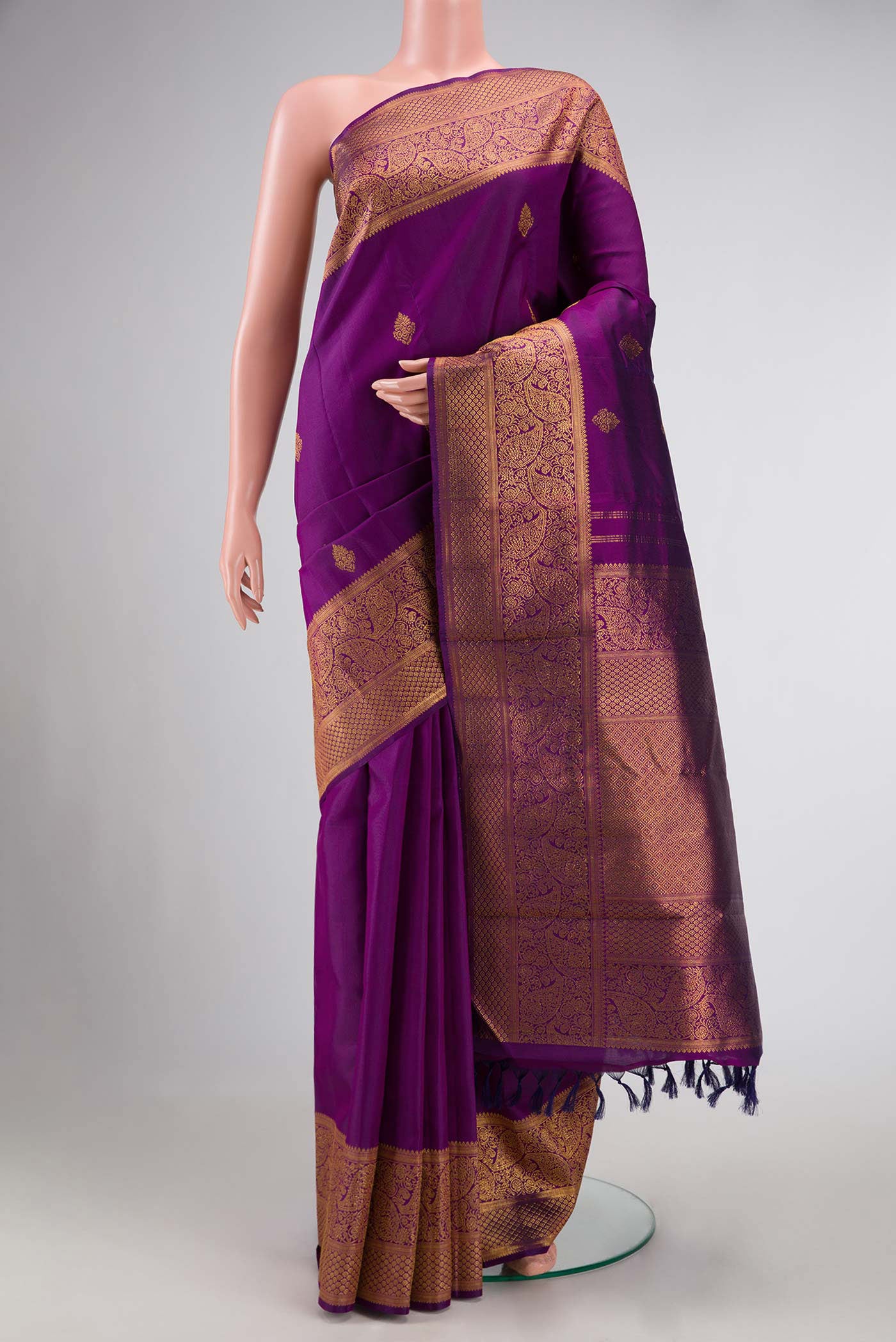 Purple Dual Tone Kanchipuram Silk Saree with Zari Butta on the body and Zari Border displayed on a mannequin