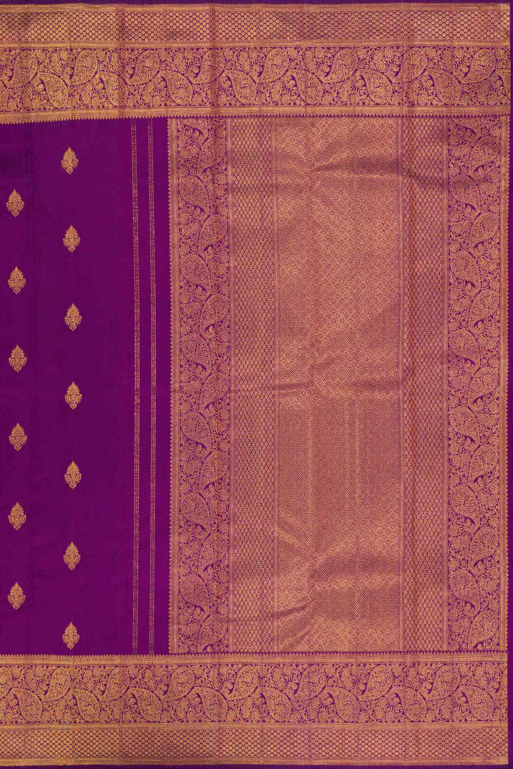 Close up image of the pallu of Purple Dual Tone Kanchipuram Silk Saree with Zari Butta on the body and Zari Border