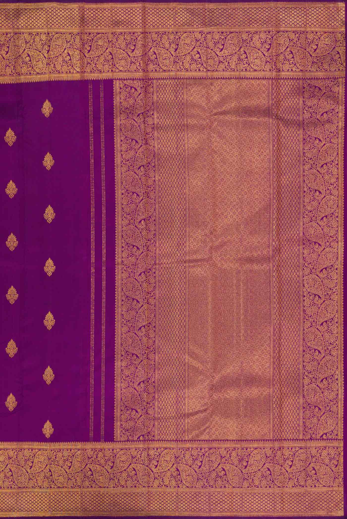Close up image of the pallu of Purple Dual Tone Kanchipuram Silk Saree with Zari Butta on the body and Zari Border
