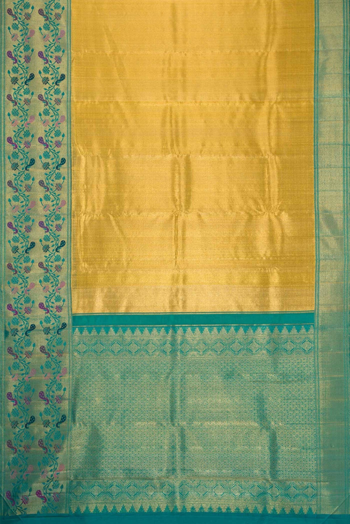 Flat view of Gold Dual Tone Kanjivaram Tissue Silk Saree with Zari Brocade on the body and Zari And Thread Border. 