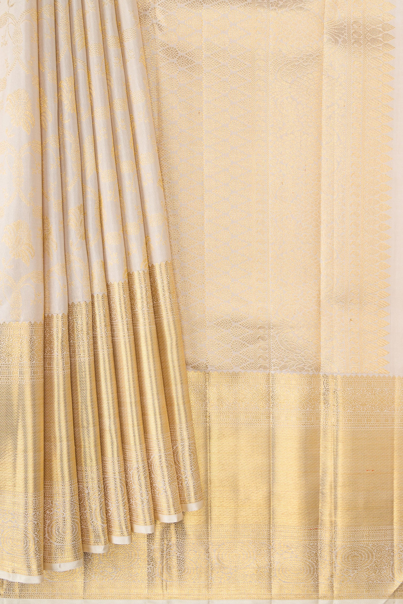Pleats and pallu of Off White Dual Tone Kanchipuram Silk Saree with Zari Brocade on the body and Zari Border. 