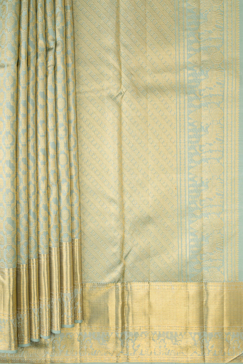 Pleats and pallu of Pista Green Dual Tone Kanchipuram Silk Saree with Zari Brocade on the body and Zari Border. 