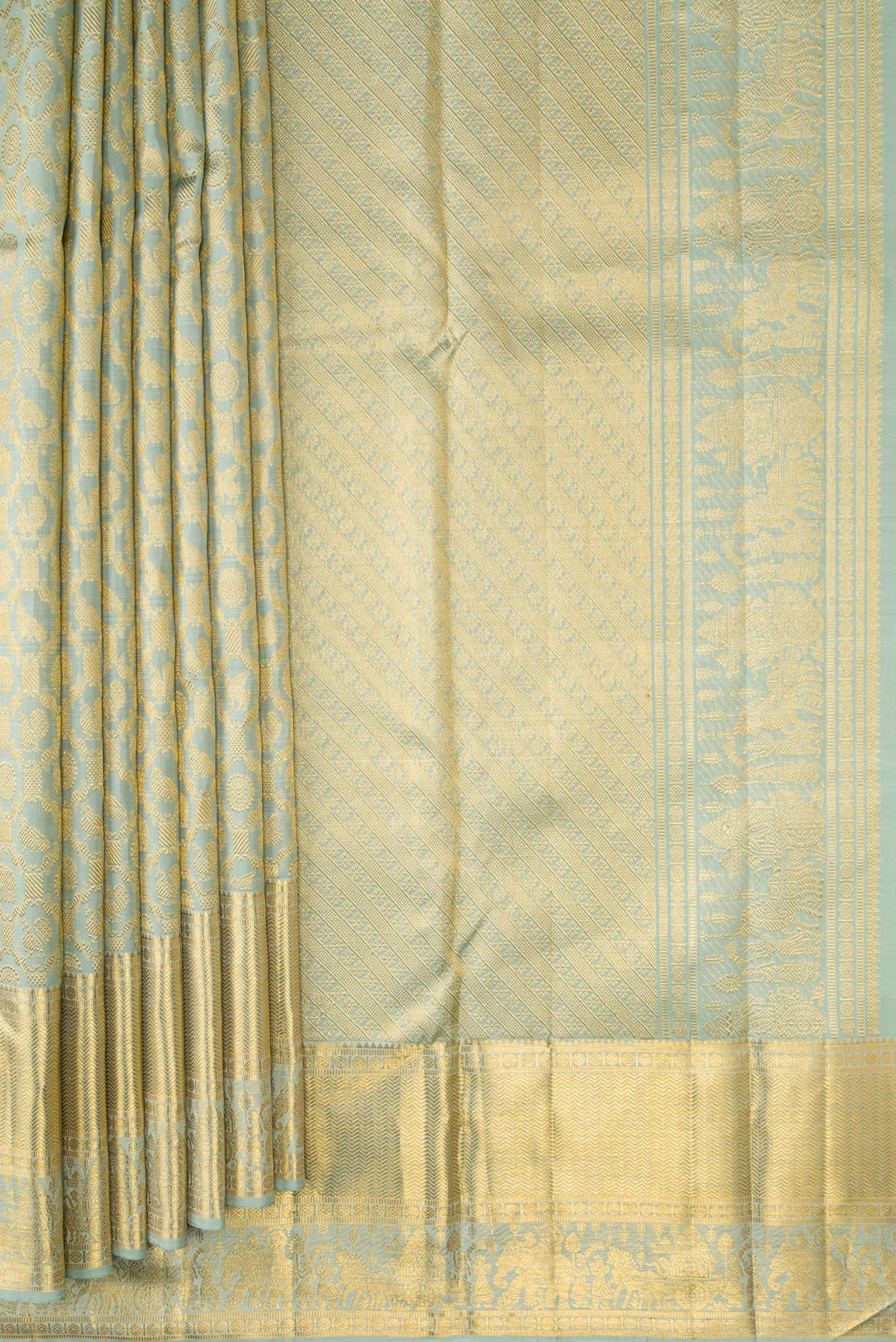 Pleats and pallu of Pista Green Dual Tone Kanchipuram Silk Saree with Zari Brocade on the body and Zari Border. 