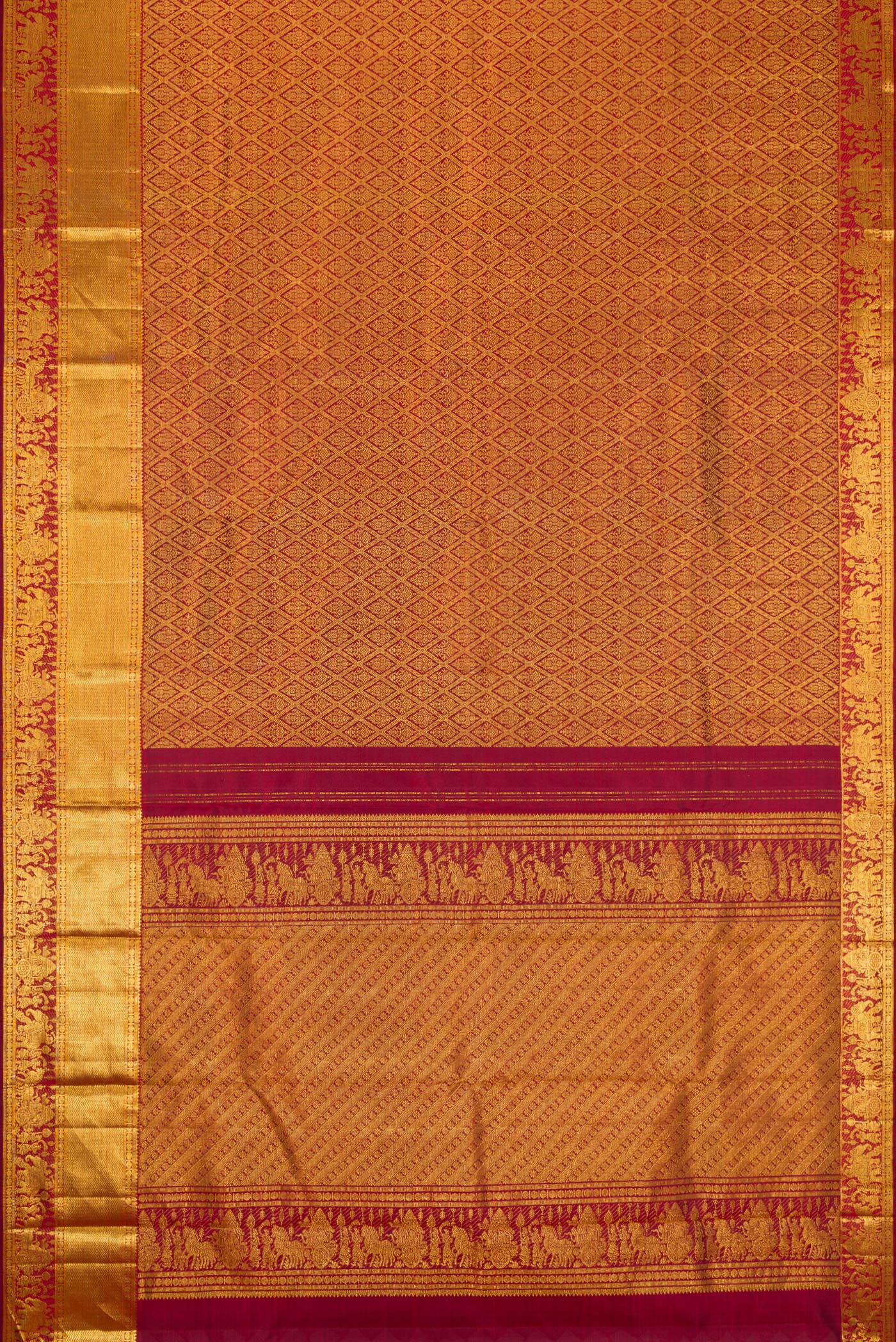 Flat view of Maroon Dual Tone Kanchipuram Silk Saree with Zari Brocade on the body and Zari Border. 