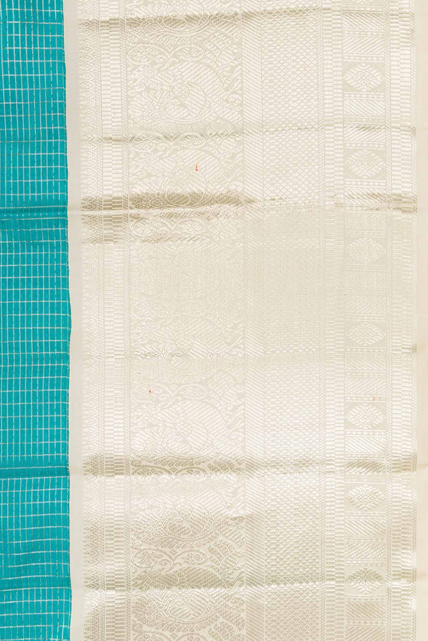 Border image of Sky Blue Dual Tone Kanchipuram Silk Saree with Zari Brocade on the body and Zari Border. 