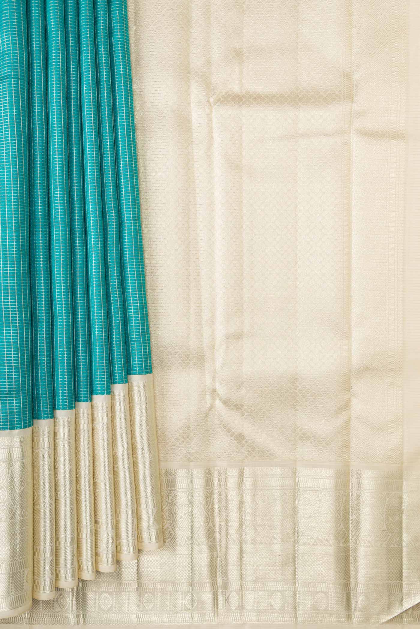 Pleats and pallu of Sky Blue Dual Tone Kanchipuram Silk Saree with Zari Brocade on the body and Zari Border. 