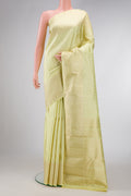 Pista Green Dual Tone Kanchipuram Silk Saree with Zari Butta on the body and Zari Border.  displayed on a mannequin