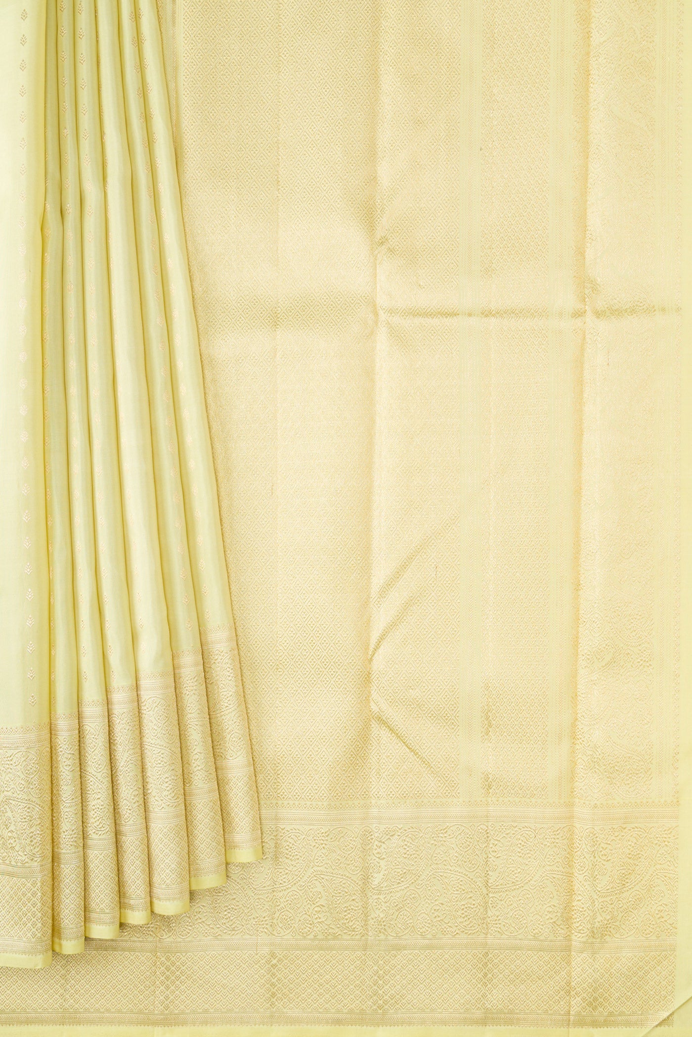 Pleats and pallu of Pista Green Dual Tone Kanchipuram Silk Saree with Zari Butta on the body and Zari Border. 