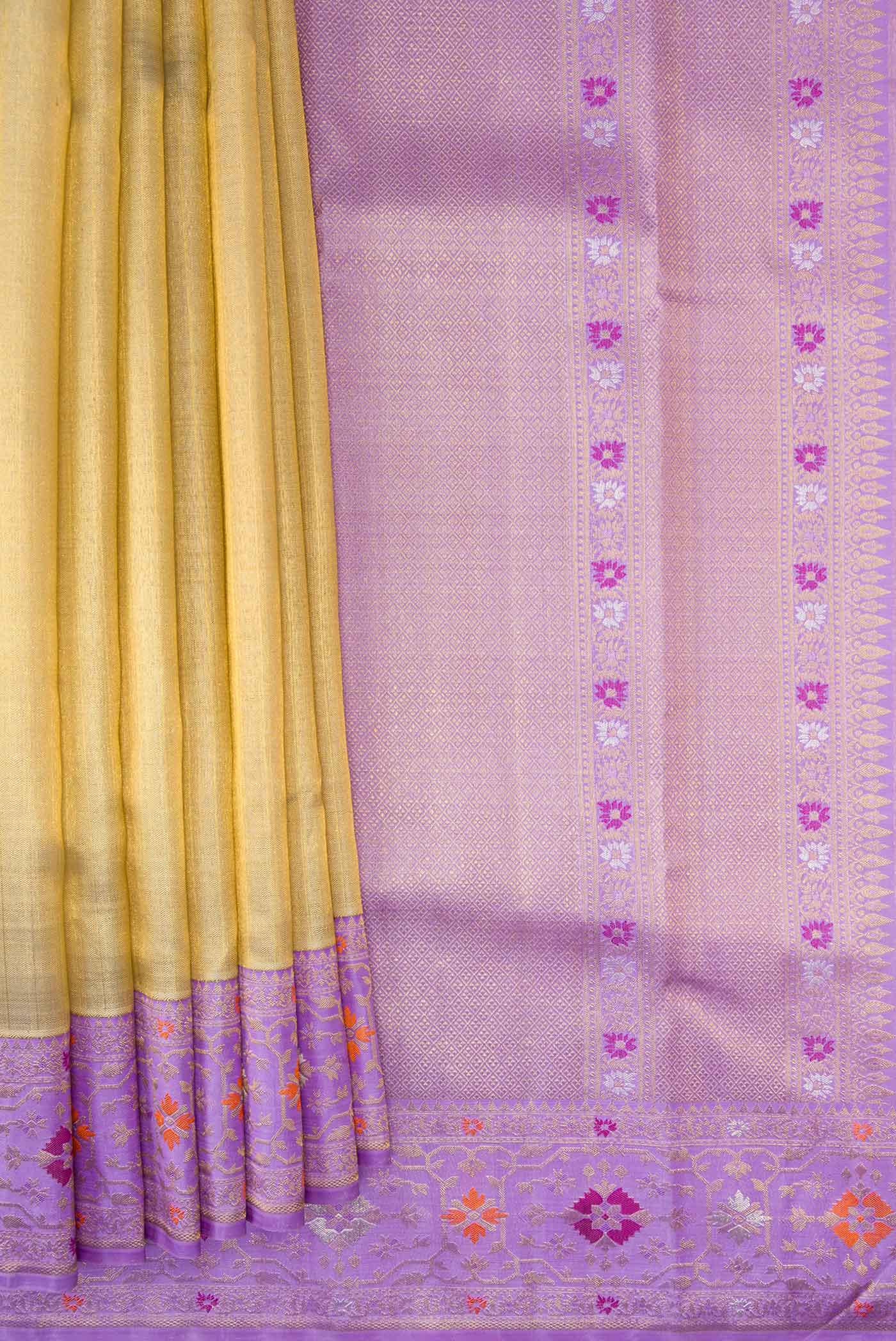 Pleats and pallu of Gold Dual Tone Kanjivaram Tissue Silk Saree with Zari Brocade on the body and Zari And Thread Border. 