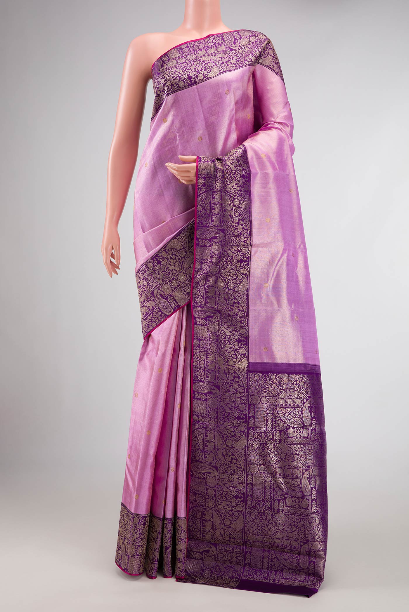 Lavender Dual Tone Kanjivaram Tissue Silk Saree with Zari Brocade on the body and Zari Border.  displayed on a mannequin