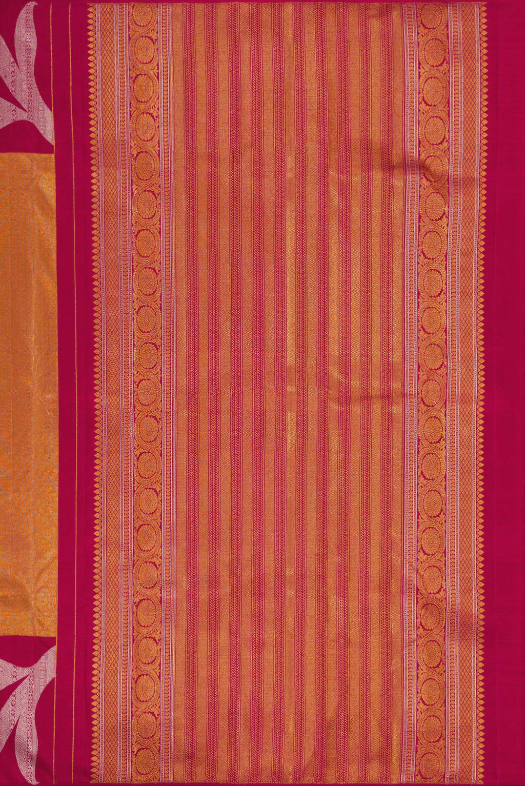 Close up image of the pallu of Maroon Dual Tone Kanjivaram Silk Saree with Zari Brocade on the body and Zari Border. 