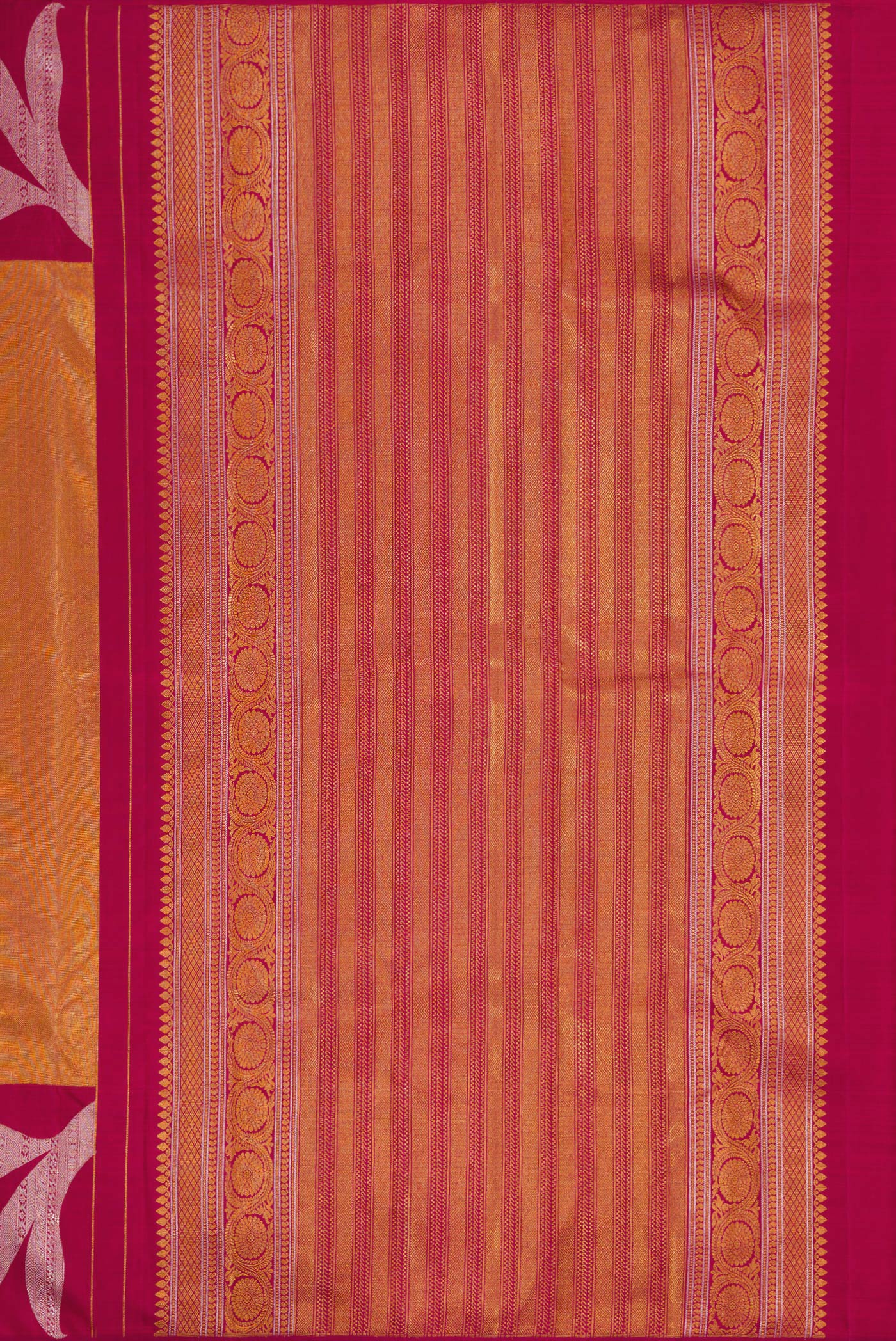 Close up image of the pallu of Maroon Dual Tone Kanjivaram Silk Saree with Zari Brocade on the body and Zari Border. 