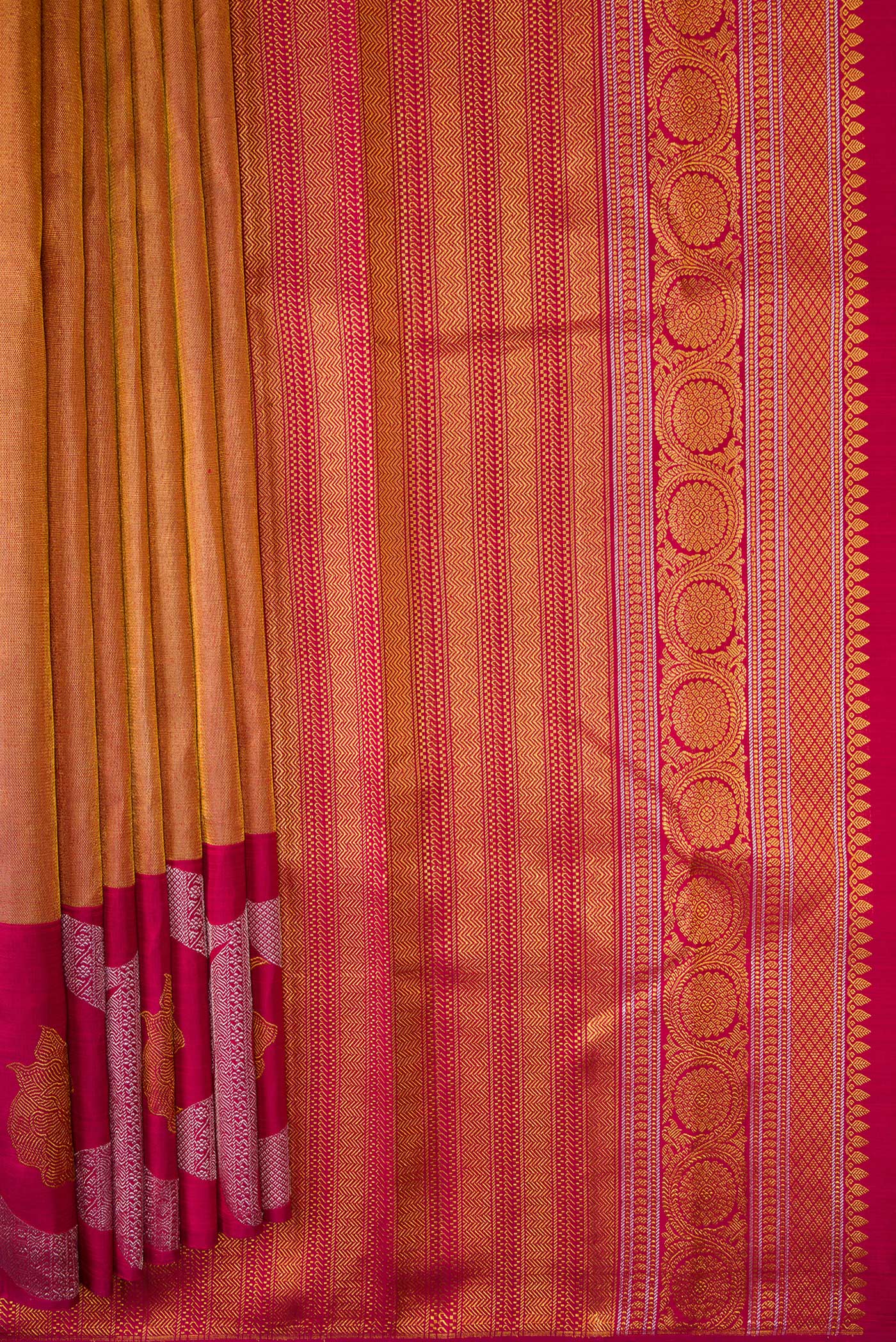 Pleats and pallu of Maroon Dual Tone Kanjivaram Silk Saree with Zari Brocade on the body and Zari Border. 