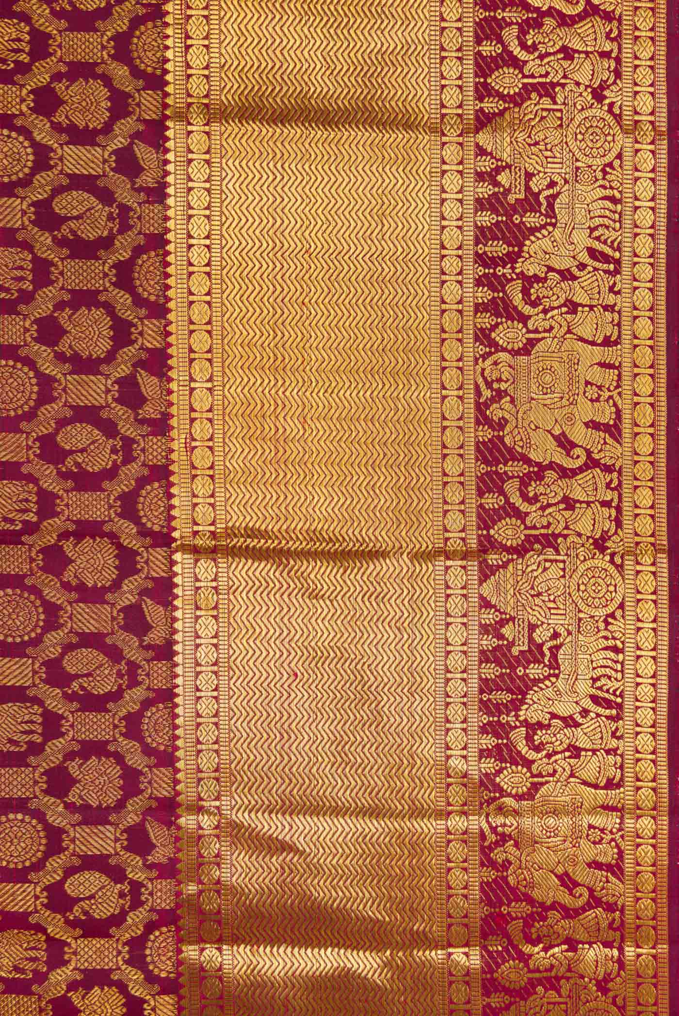 Border image of Maroon Dual Tone Kanchipuram Silk Saree with Zari Brocade on the body and Zari Border. 