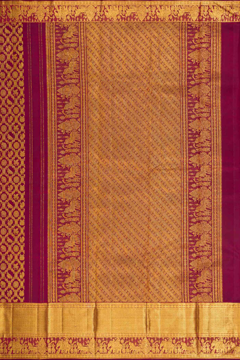 Close up image of the pallu of Maroon Dual Tone Kanchipuram Silk Saree with Zari Brocade on the body and Zari Border. 