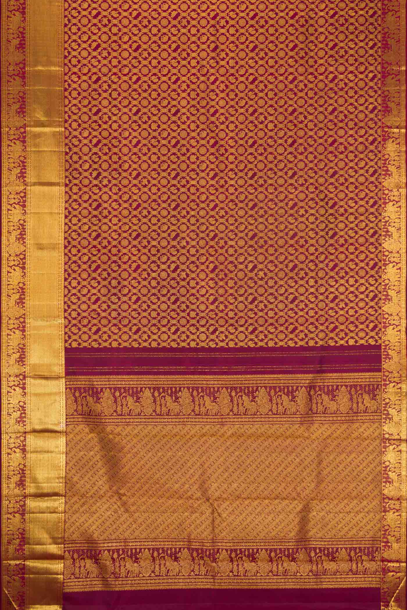 Flat view of Maroon Dual Tone Kanchipuram Silk Saree with Zari Brocade on the body and Zari Border. 