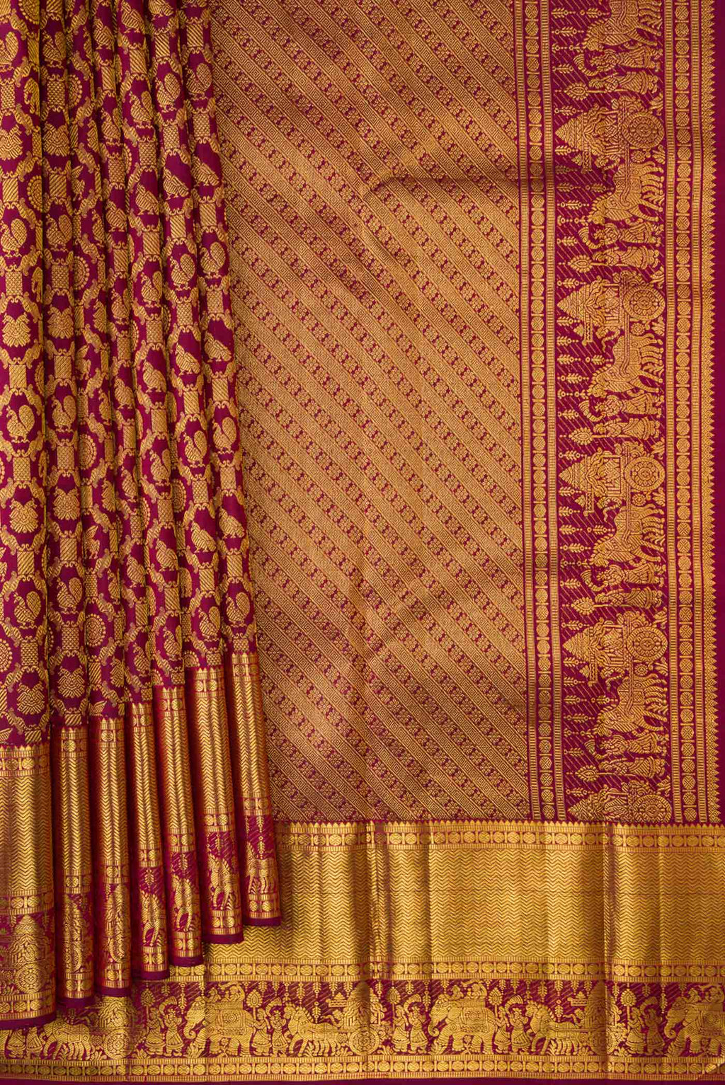 Pleats and pallu of Maroon Dual Tone Kanchipuram Silk Saree with Zari Brocade on the body and Zari Border. 
