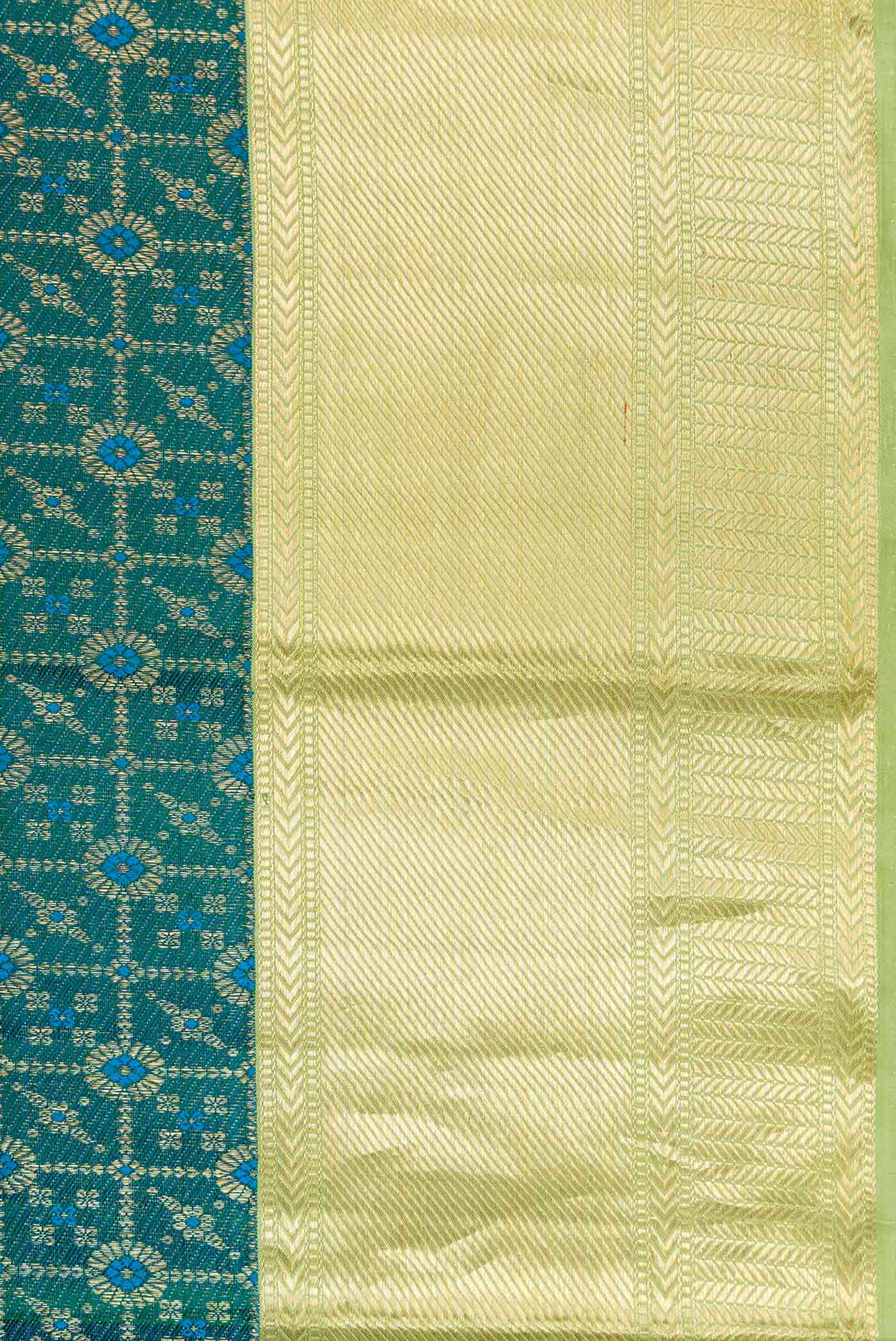 Border image of Peacock Blue Dual Tone Kanchipuram Silk Saree with Zari Brocade on the body and Zari Border. 