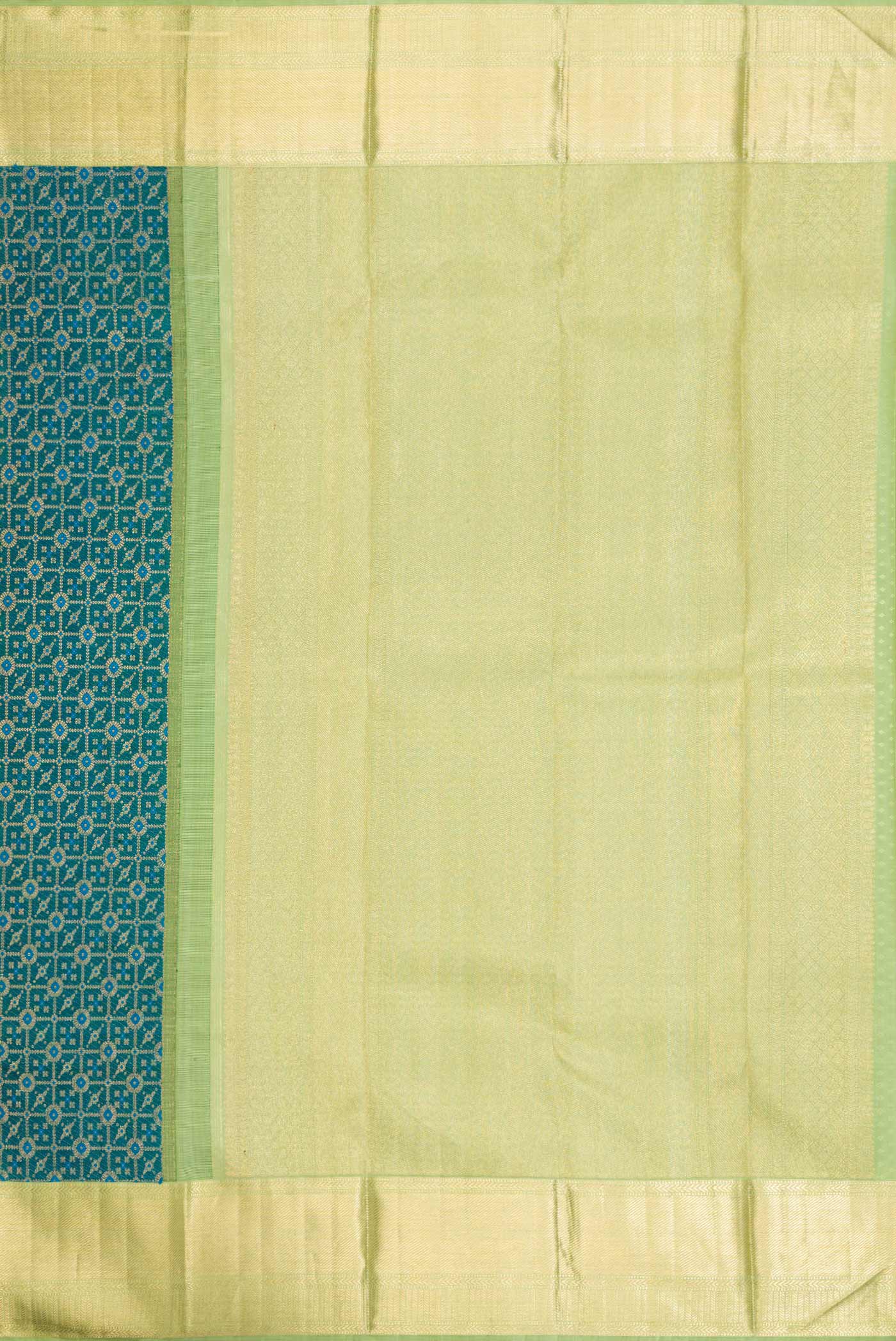 Close up image of the pallu of Peacock Blue Dual Tone Kanchipuram Silk Saree with Zari Brocade on the body and Zari Border. 