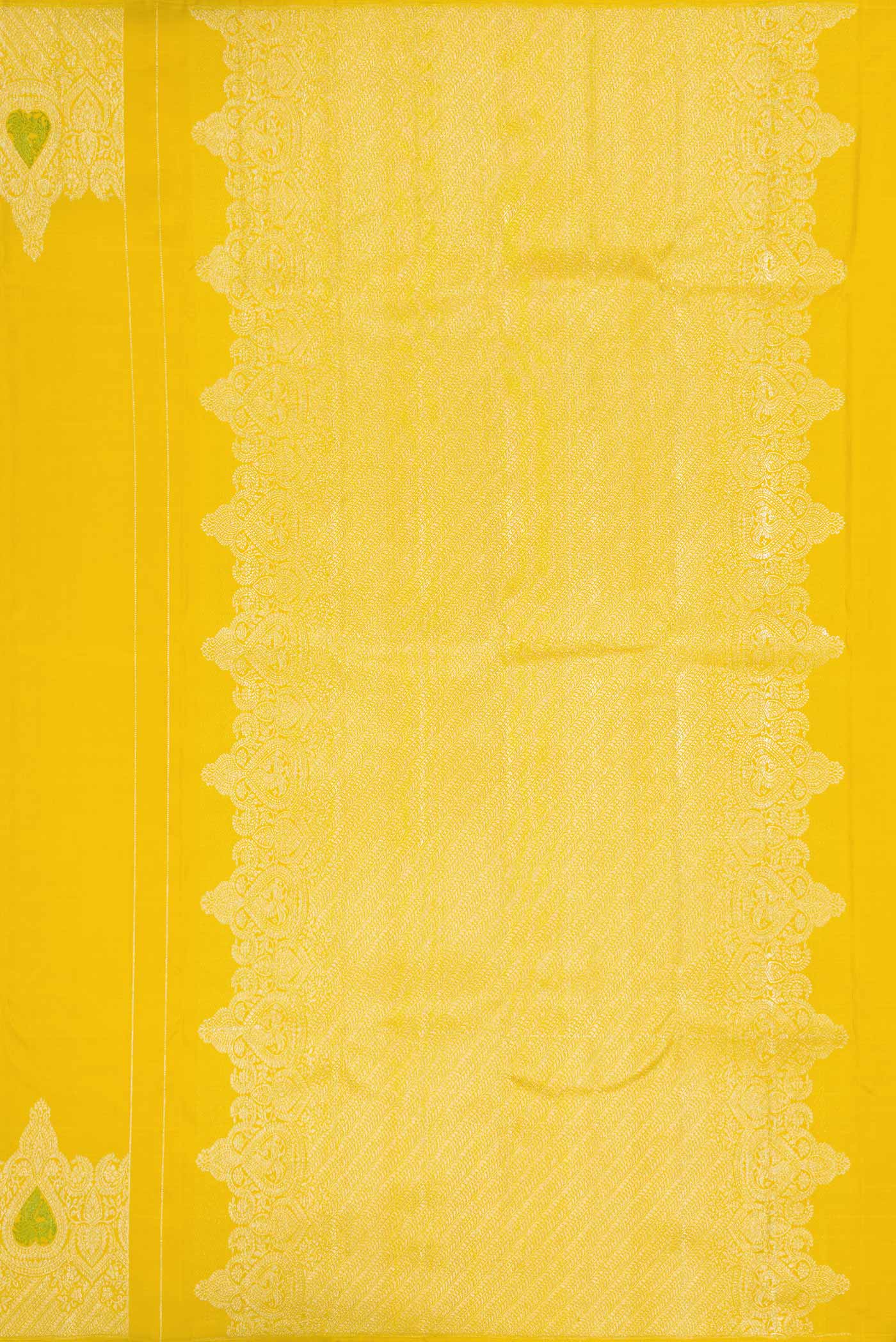 Close up image of the pallu of Pure Silk Pure Zari Yellow Dual Tone Kanchipuram Saree with Zari Butta on the body and Fancy Border. 
