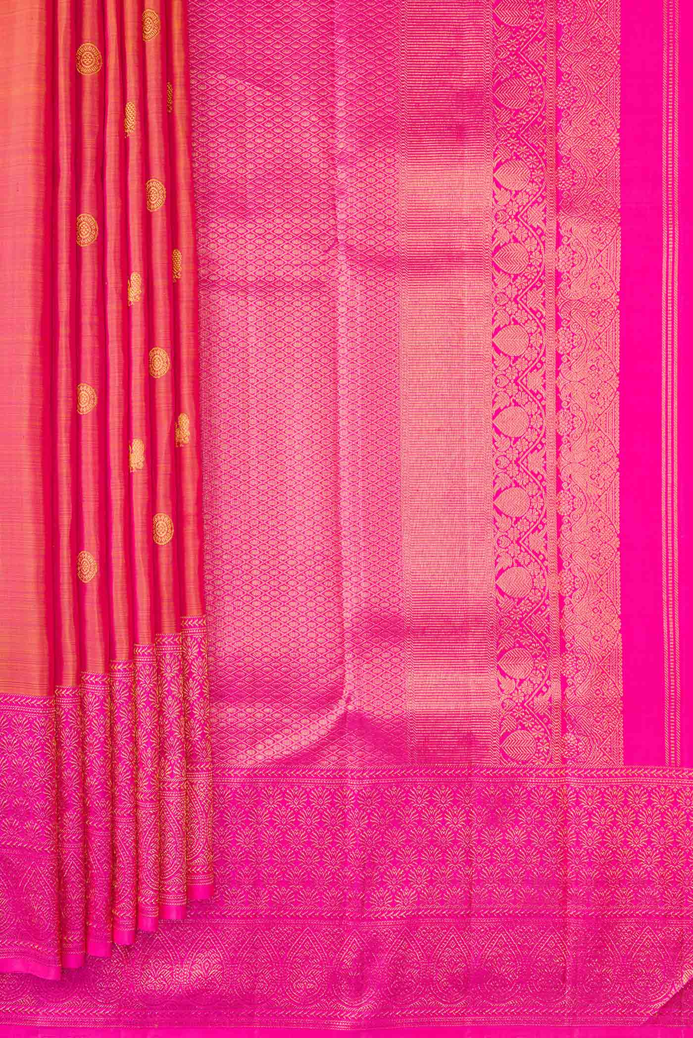 Pleats and pallu of Mustard Dual Tone Kanjivaram Silk Saree with Zari Butta on the body and Zari Border. 