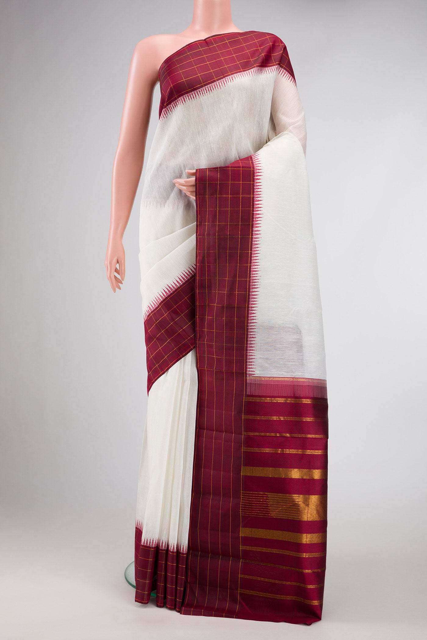 Off White Dual Tone Linen Saree with Plain Body and Checks Border.  displayed on a mannequin