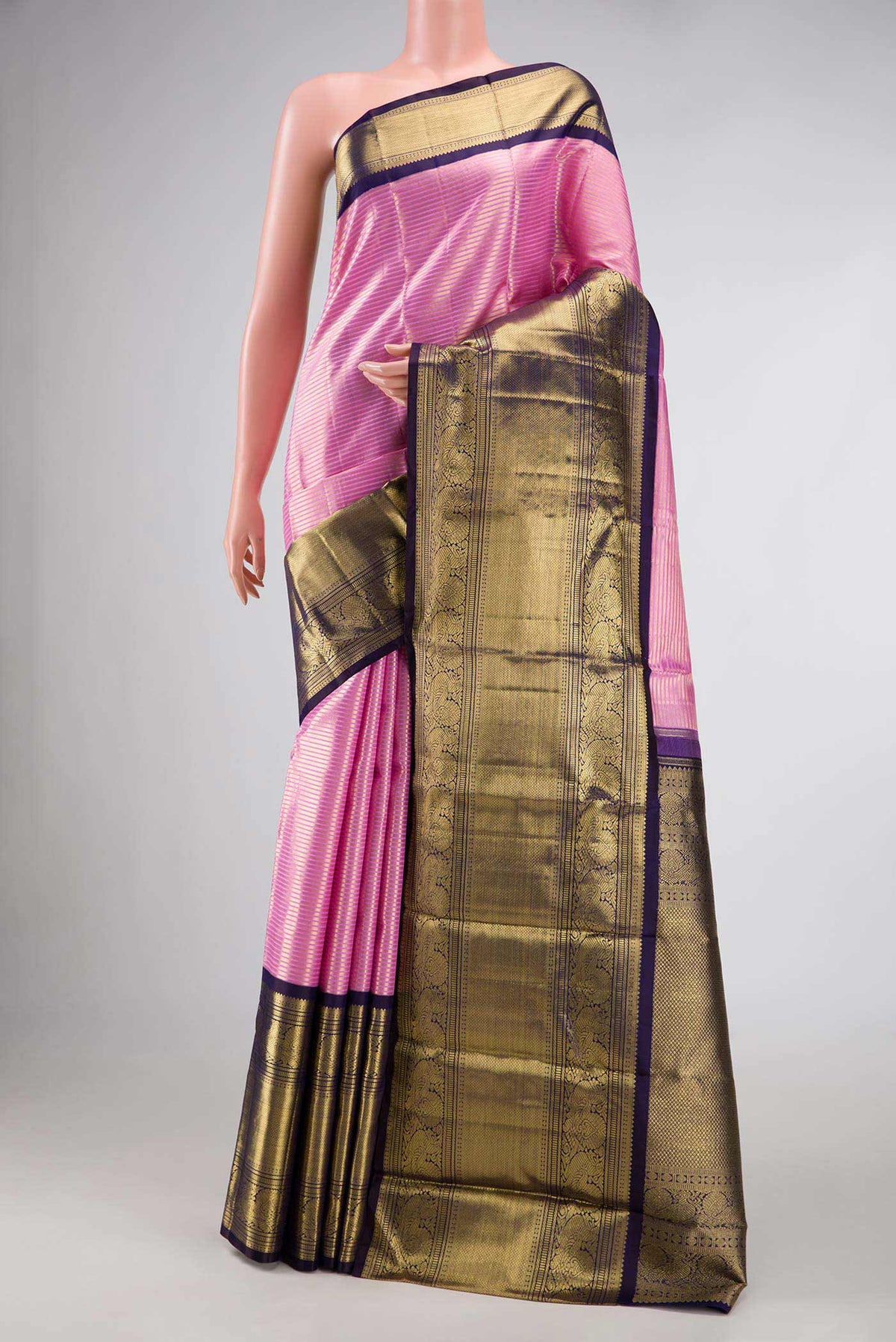 Pure Silk Pure Zari Pink Dual Tone Kanchipuram Saree with Zari Brocade on the body and Zari Border displayed on a mannequin