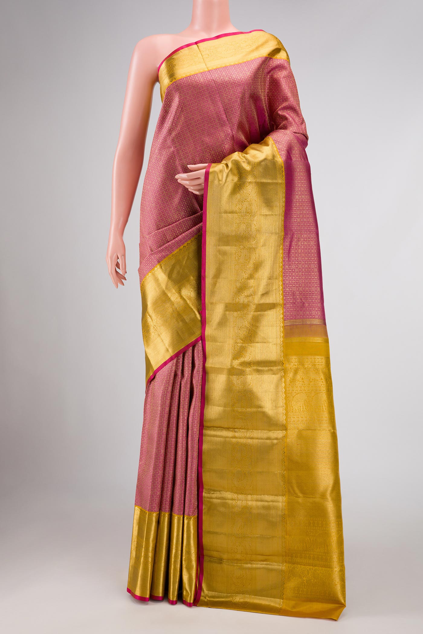 Pure Silk Pure Zari Pink Dual Tone Kanchipuram Saree with Zari Brocade on the body and Zari Border displayed on a mannequin