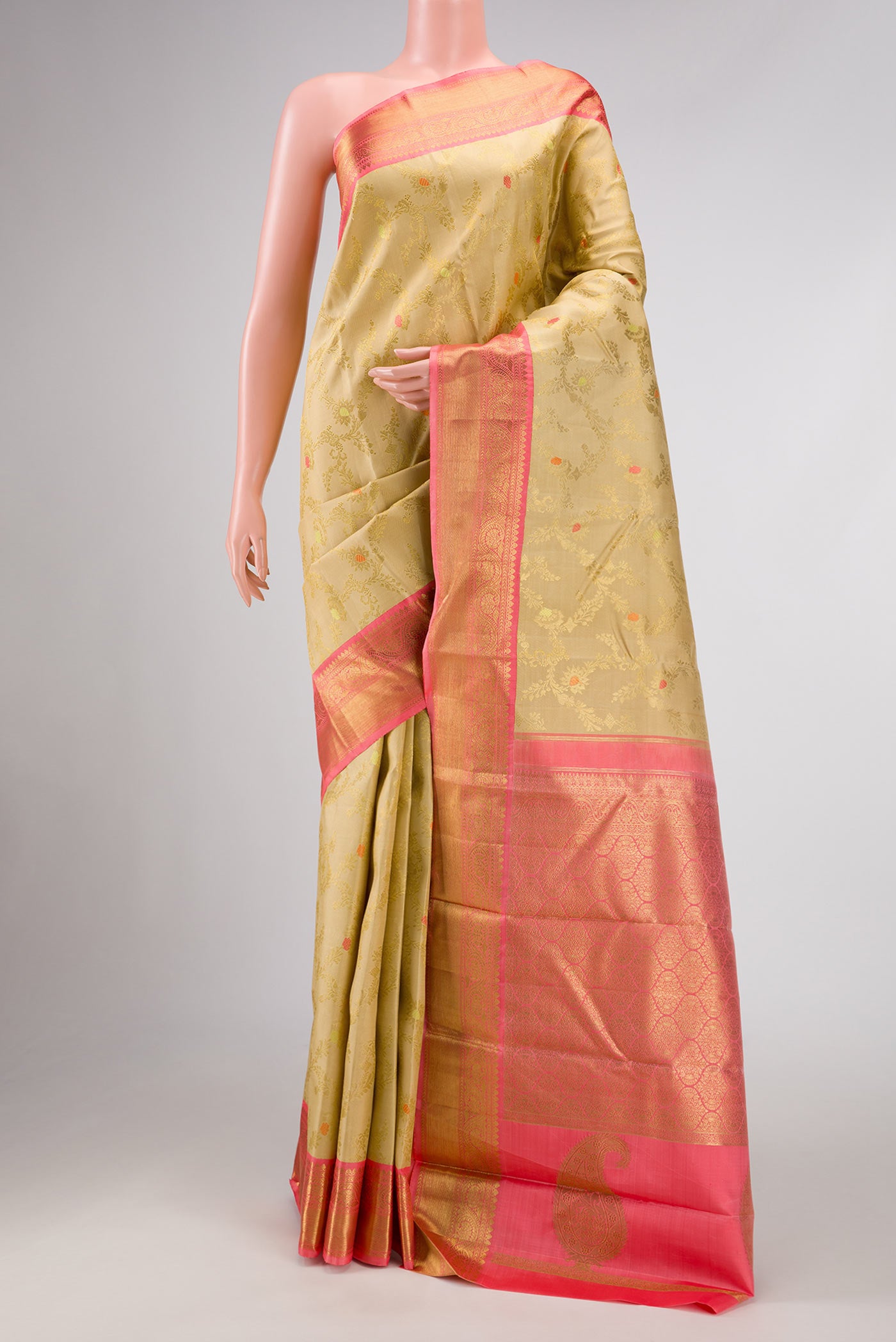 Pure Silk Pure Zari Beige Dual Tone Kanchipuram Saree with Zari Brocade on the body and Zari Border displayed on a mannequin