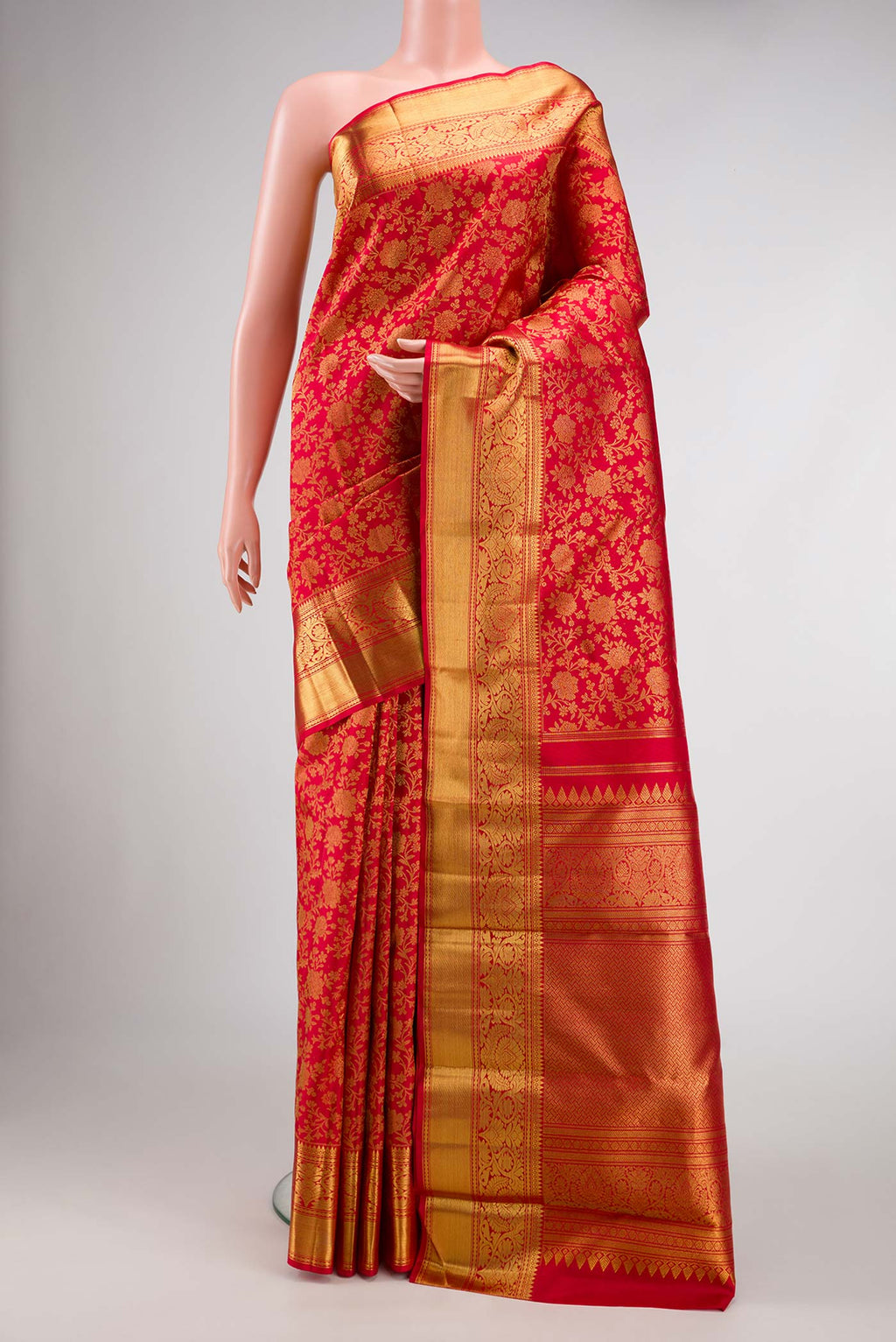 Pure Silk Pure Zari Maroon Dual Tone Kanjivaram Saree with Zari Brocade on the body and Zari Border.  displayed on a mannequin