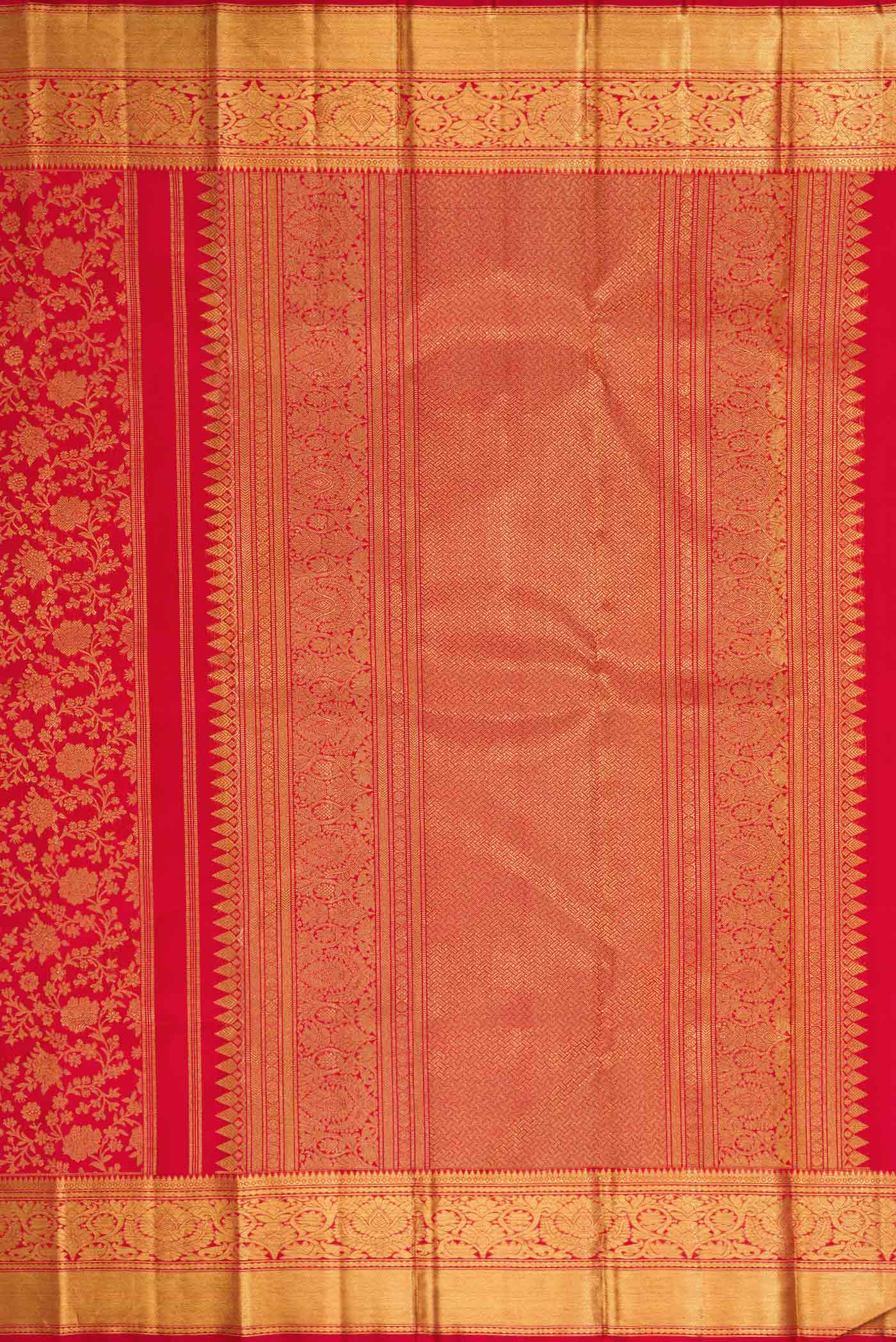 Close up image of the pallu of Pure Silk Pure Zari Maroon Dual Tone Kanjivaram Saree with Zari Brocade on the body and Zari Border. 