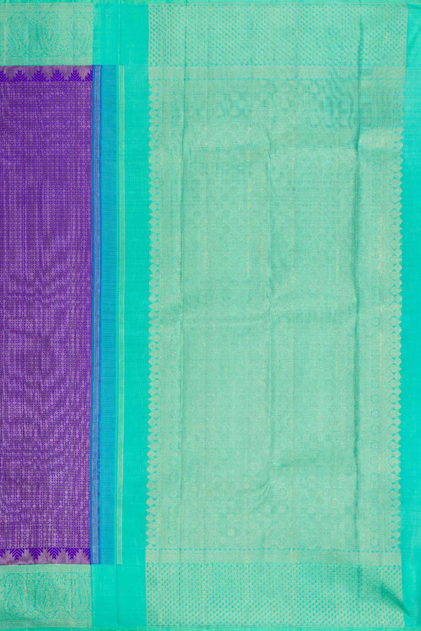 Close up image of the pallu of Pure Silk Pure Zari Royal Blue Dual Tone Kanchipuram Saree with Zari Brocade on the body and Zari Border