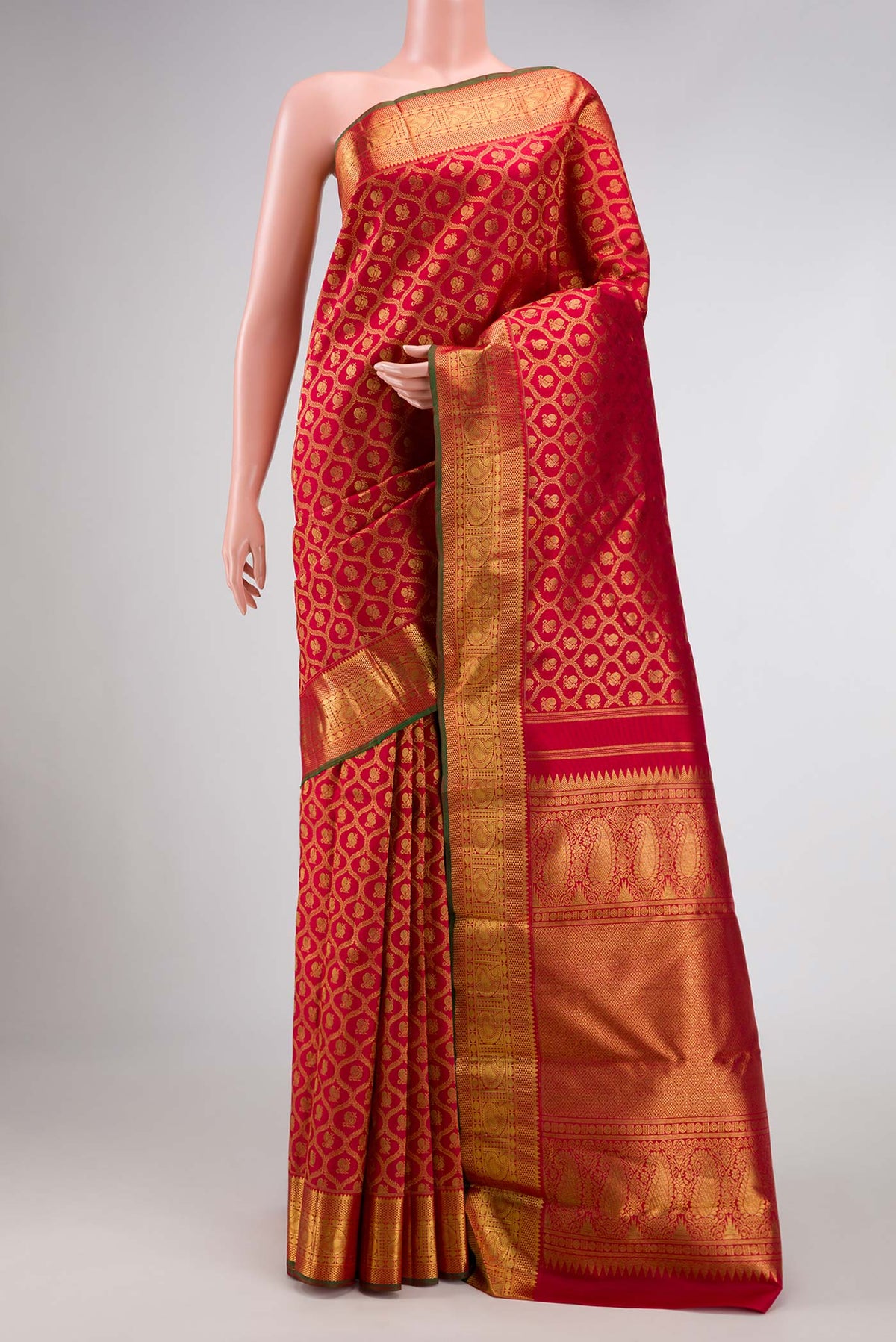 Pure Silk Pure Zari Red Dual Tone Kanchipuram Saree with Zari Brocade on the body and Zari Border displayed on a mannequin