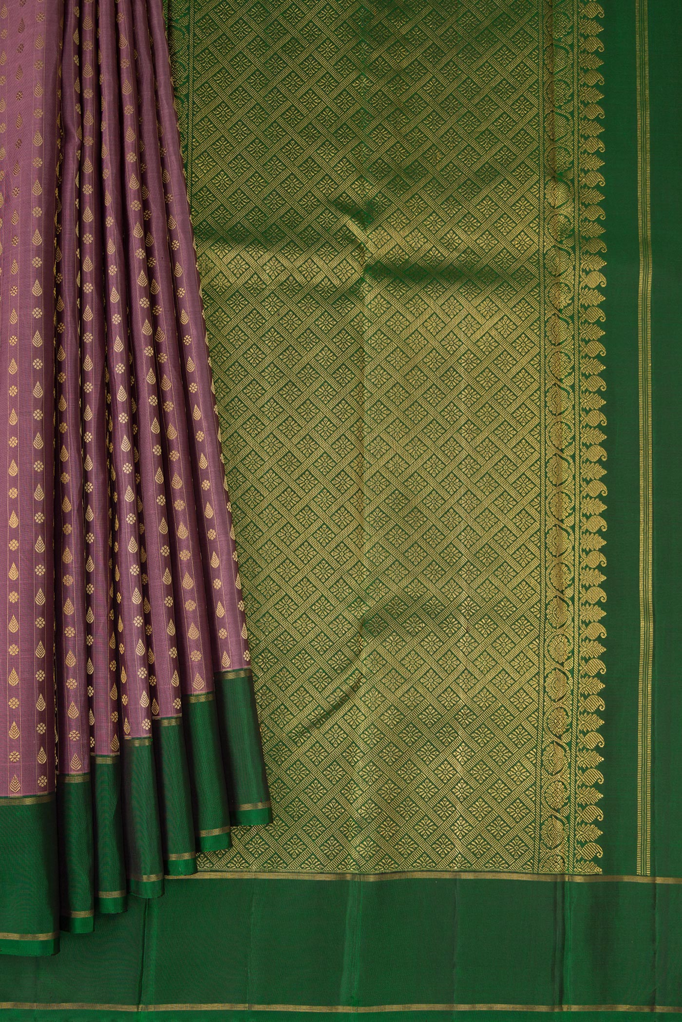 Pleats and pallu of Pure Silk Pure Zari Brown Dual Tone Kanchipuram Saree with Zari And Thread Butta on the body and Zari Border. 