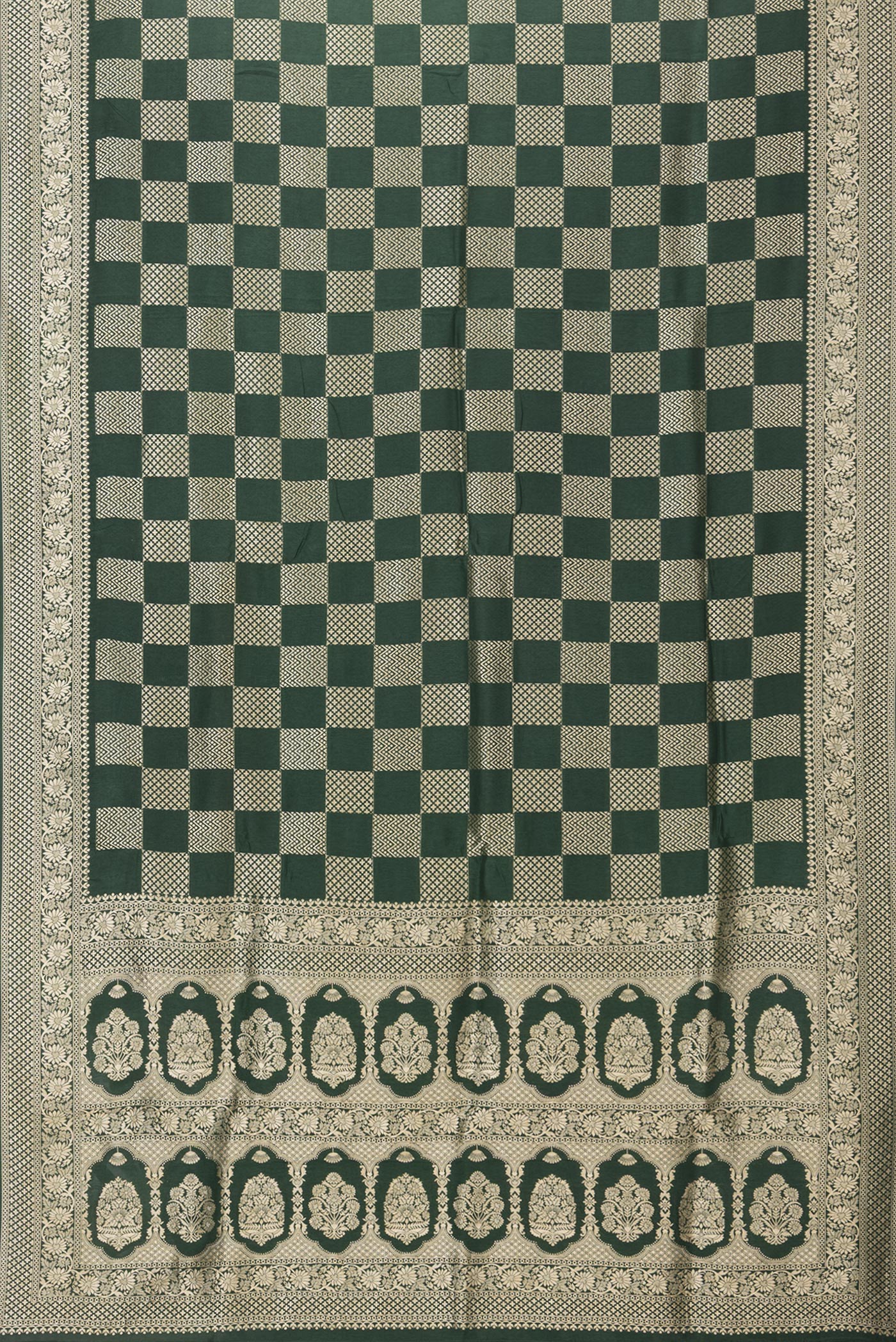Flat view of Bottle Green Dual Tone Blended Banarasi Silk Saree with Zari Brocade on the body and Zari Border. 