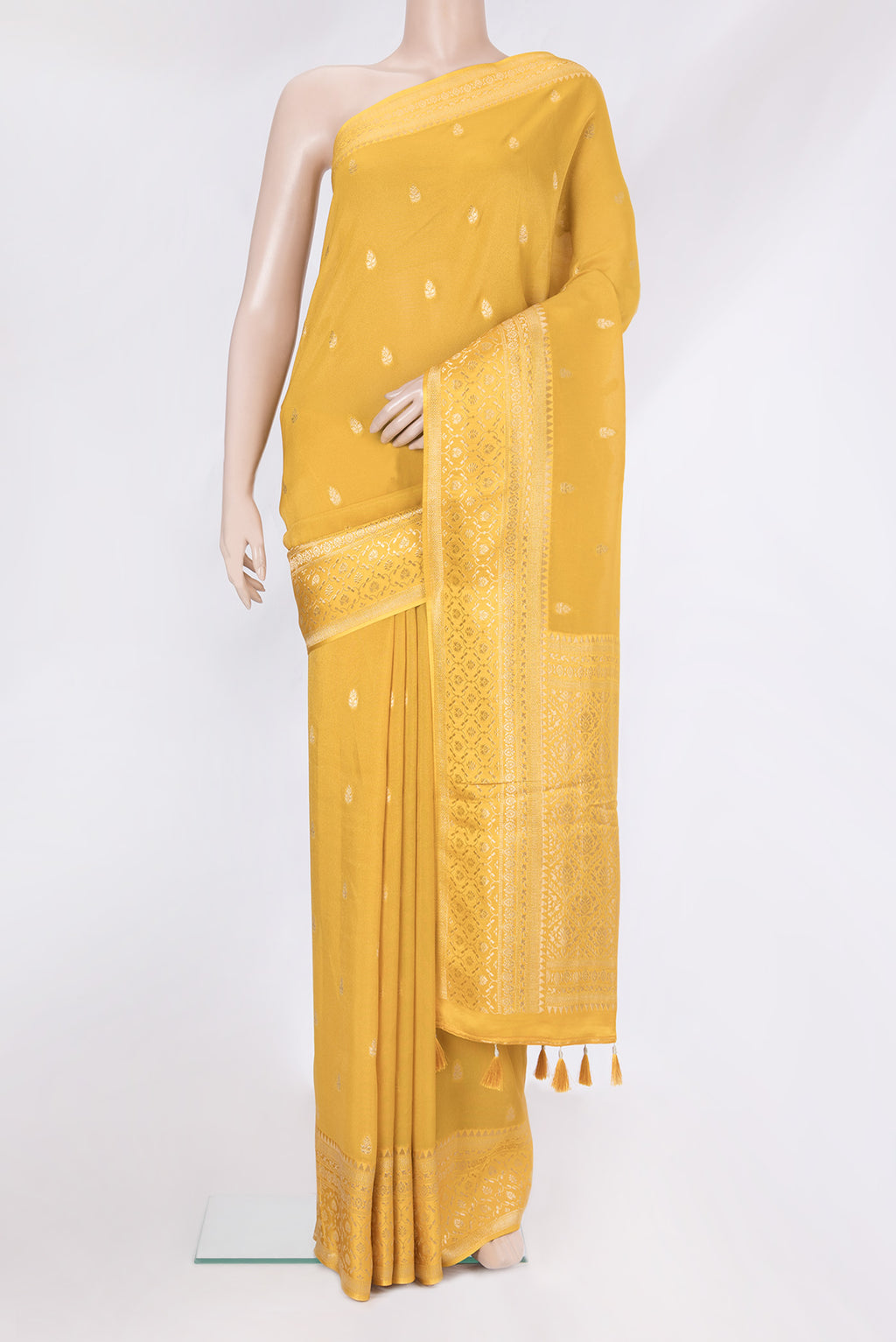 Mustard Blended Banarasi Silk Saree with Zari Butta on the body and Zari Border.  displayed on a mannequin